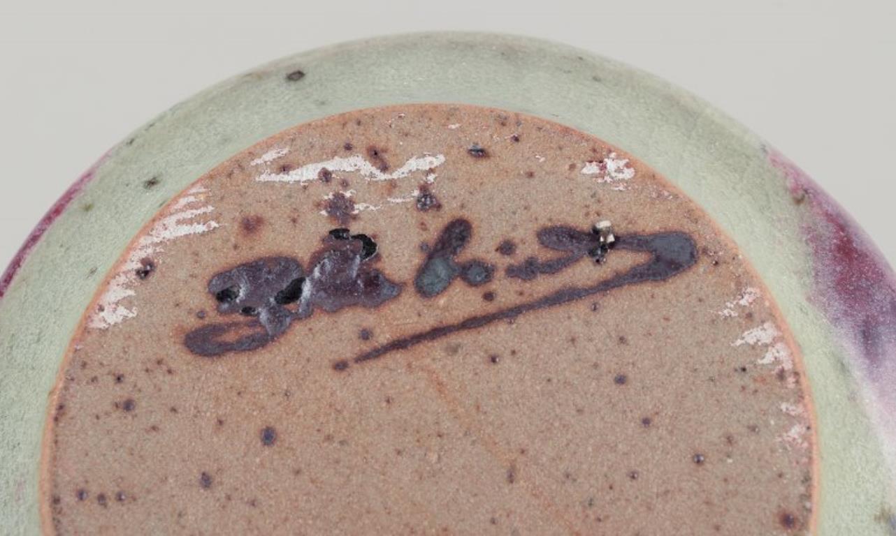 Ceramic French ceramicist. Unique ceramic vase. Glaze in shades of blue-violet. For Sale