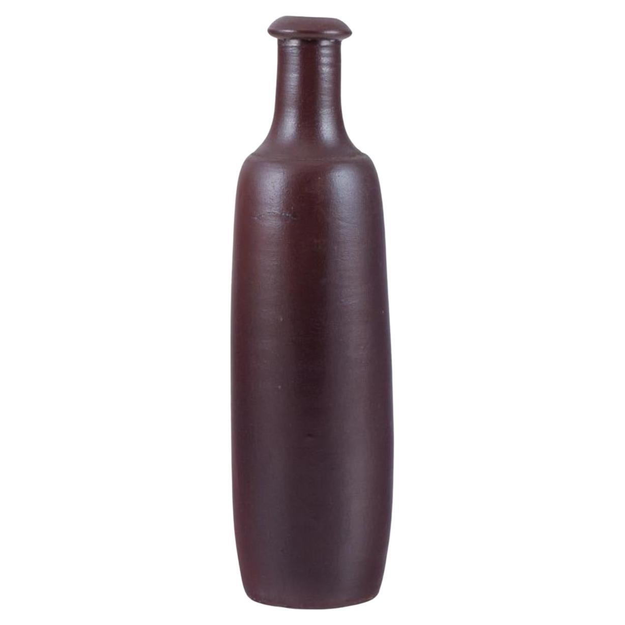 French ceramicist. Unique ceramic vase. Slender form. Brown glaze. Mid-20th C.