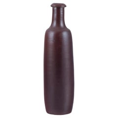 French ceramicist. Unique ceramic vase. Slender form. Brown glaze. Mid-20th C.
