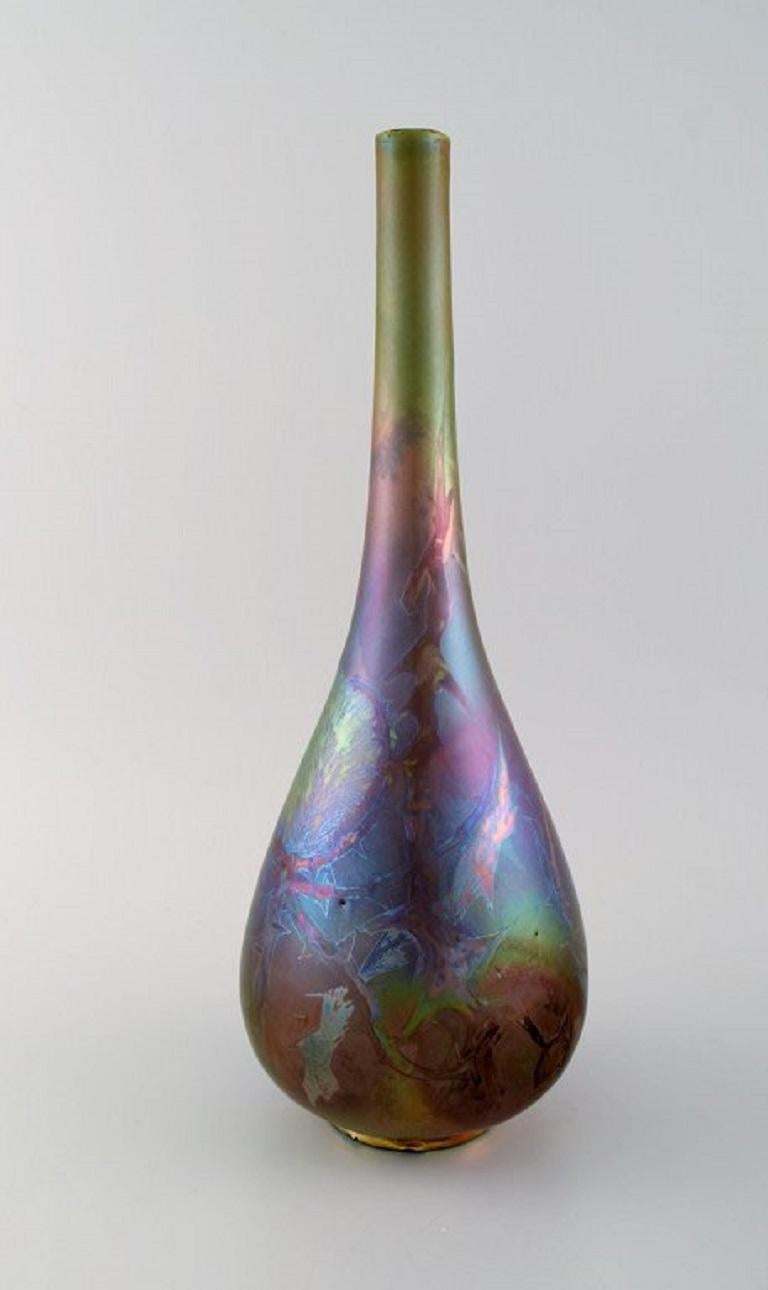 Céramiste français. Vase ancien en céramique émaillée. Belle glaçure lustrée. Début du 20e siècle.
Mesures : 37.5 x 14 cm.
En parfait état.
Signé.