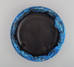 French ceramist. Two round serving dishes / bowls in glazed stoneware.