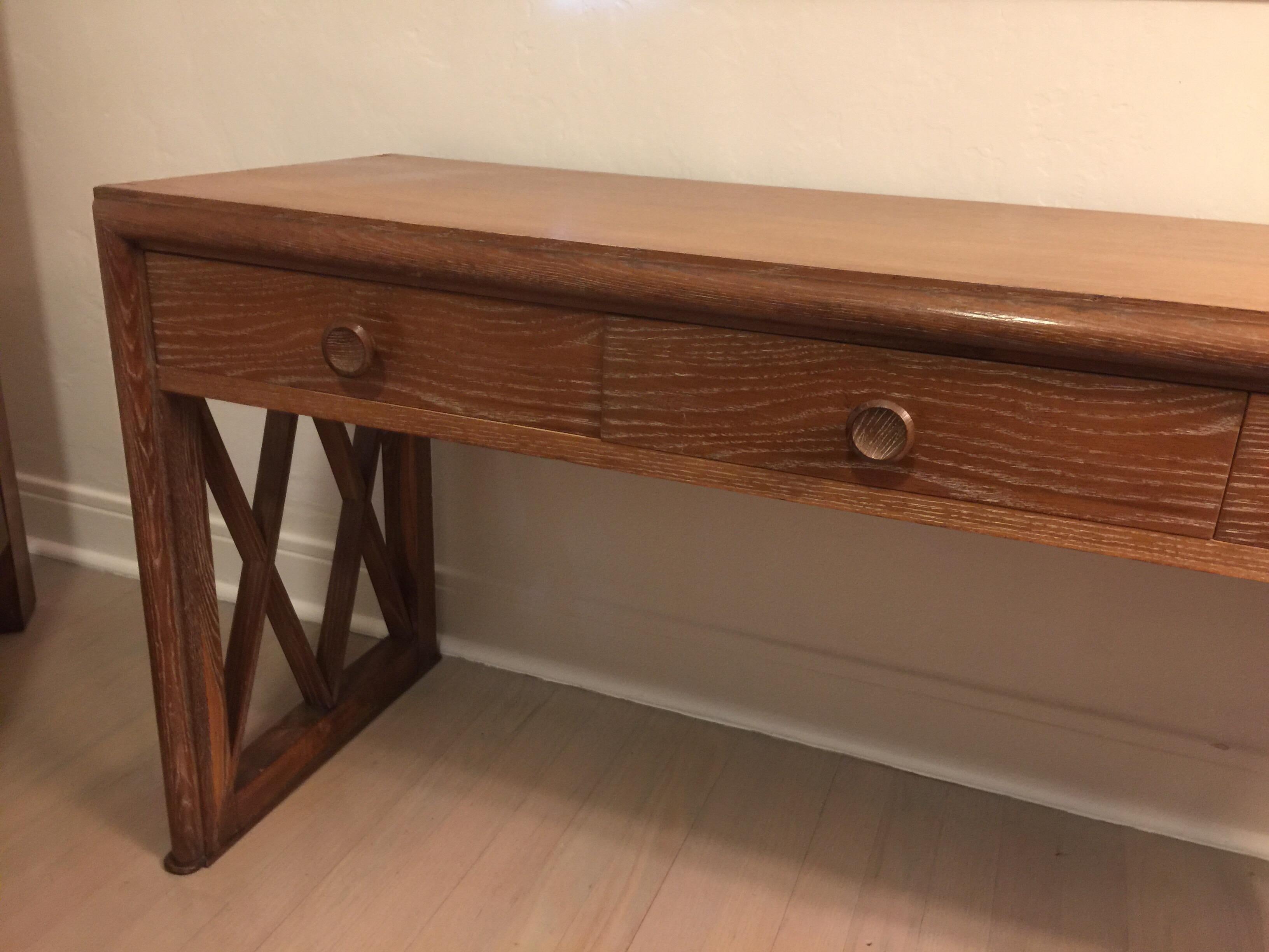 Three drawers with a lovely washed oak finish and lattice side panels. This is small but quite perfect for many spaces.