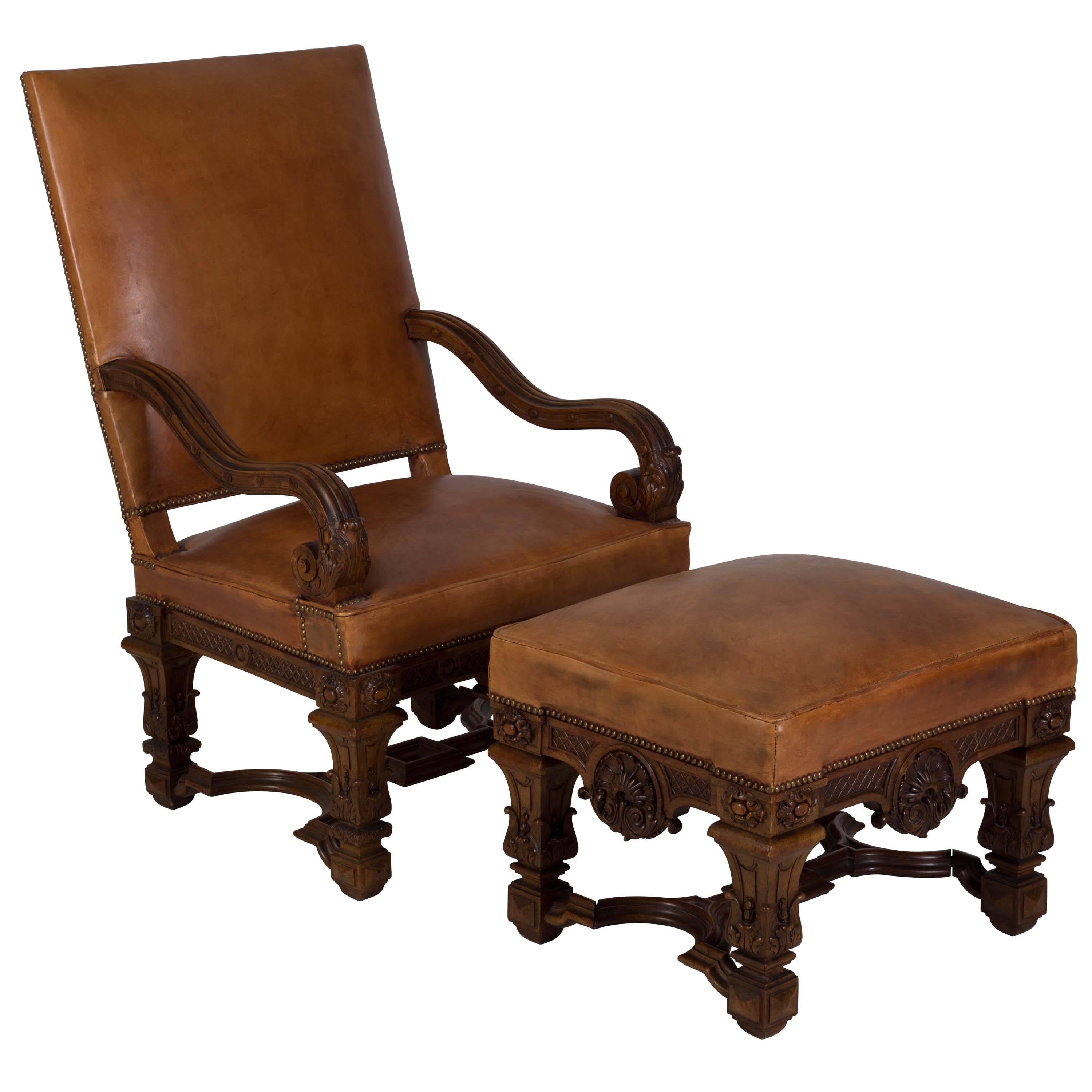 A 19th century French chair and ottoman. Very well carved with later leather upholstery. Seat height 50cm, seat depth 53.5cm.