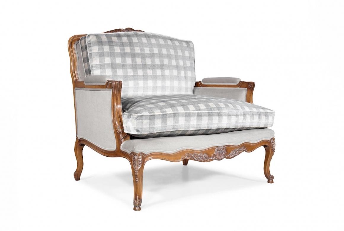 A stunning French Chamonix armchair, 20th century.

Shown in oakwood with an aged oak finish, the Chamonix is a Louis XV armchair entirely carved by hand. Incredibly comfortable and ideal for large spaces, the Chamonix features loose seat and back