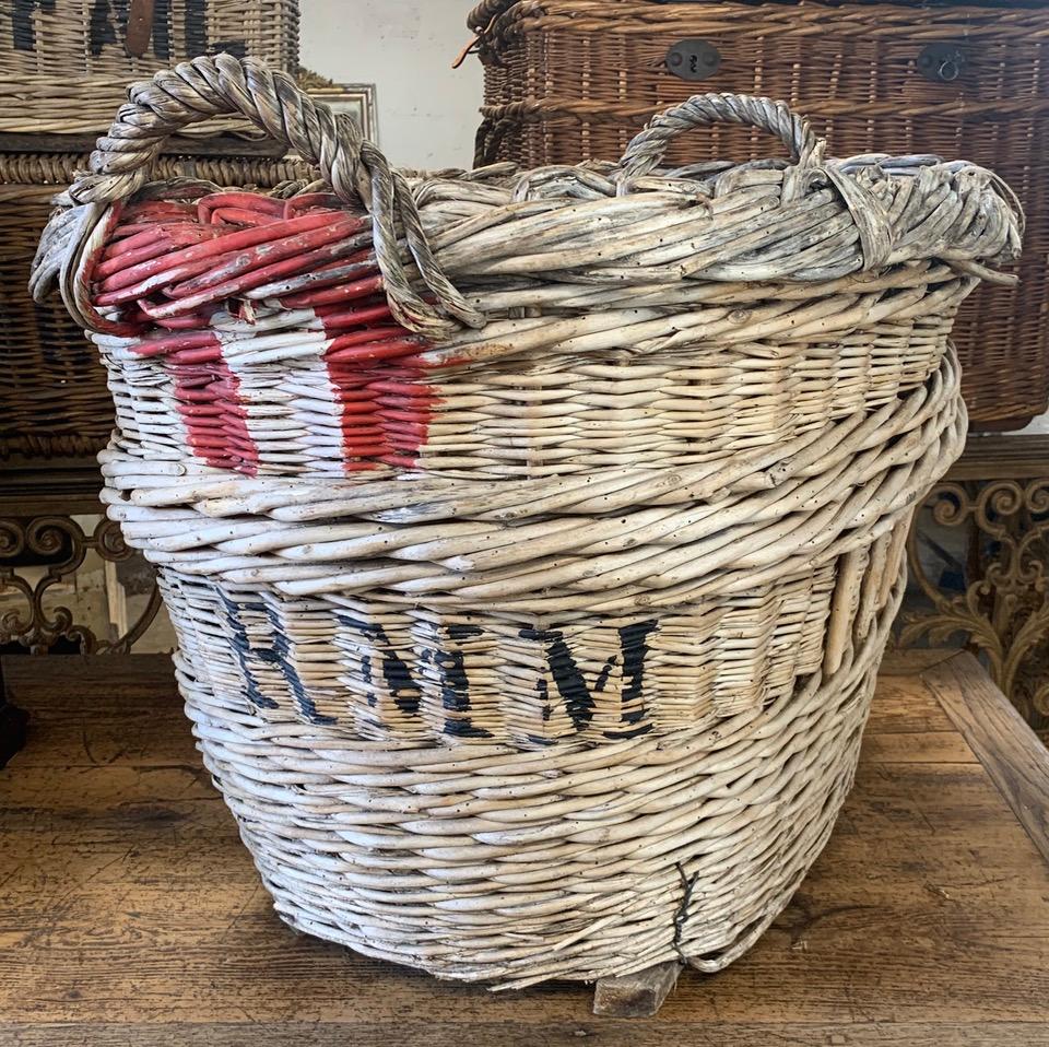 A nice early 20th century Champagne harvesting basket from the Champagne region of France. These were used to harvest the grapes in the vineyards and have the painted markings of the vineyard owner.