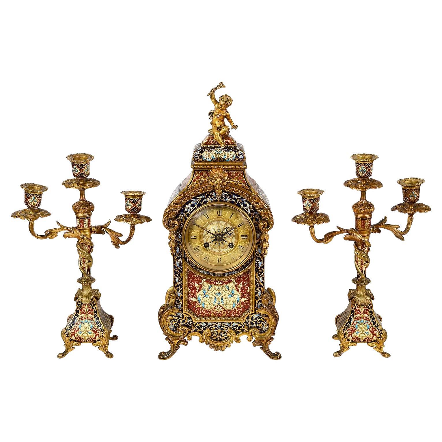 French Champleve enamel clock set, 19th Century.
