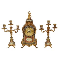 French Champleve enamel clock set, 19th Century.