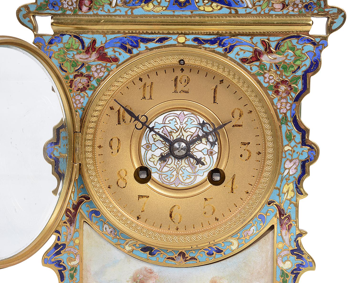 A very good quality late 19th century French Champleve enamel mantel clock, the clock has an eight day duration movement that chimes on the hour and half hour. The enamel having wonderful bold colored scrolling foliate decoration, surrounding an