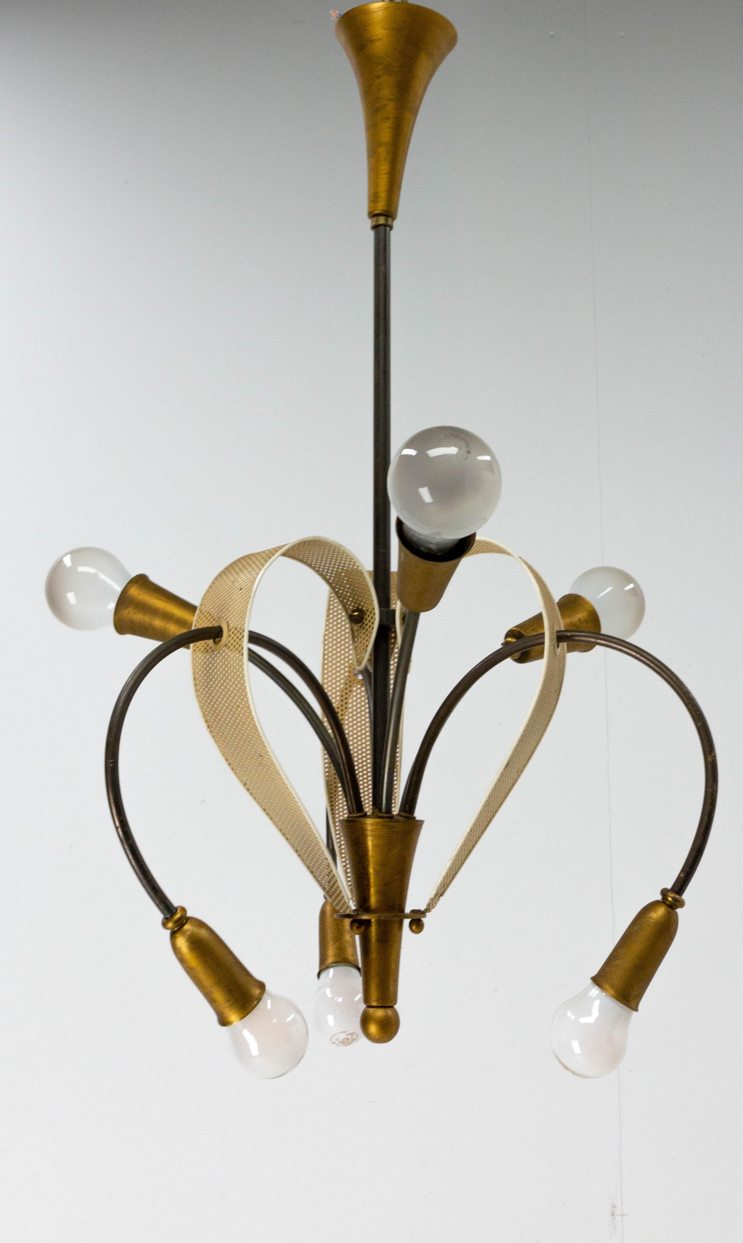 Ceiling pendant by Pierre Guariche for Disderot, France
Lustre in brass and iron 
Chandelier with six light bulbs
The electrification has been completely redone
It is conform to USA and EU or UK standards
Good condition

Shipping:
Diameter