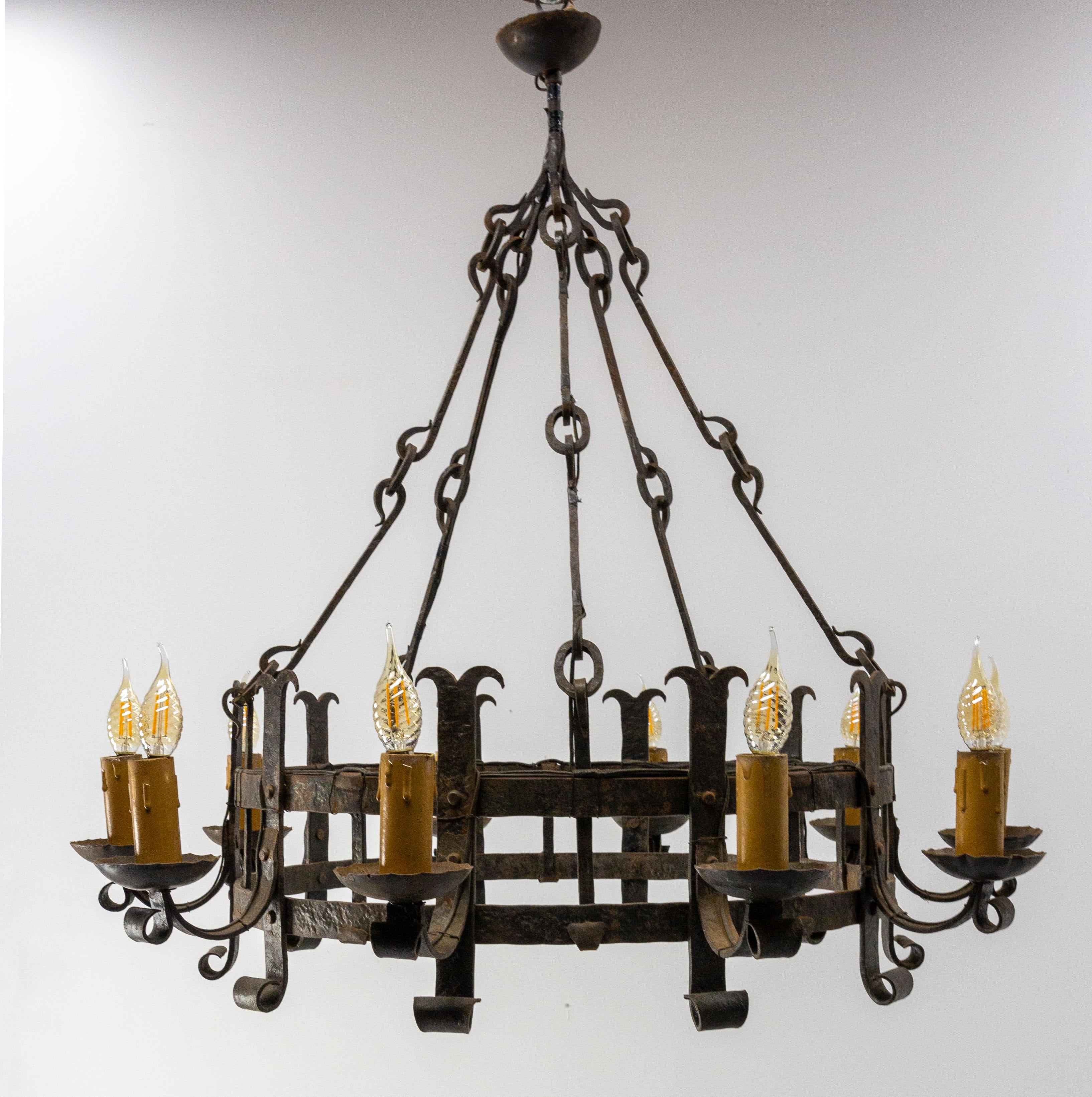 Ceiling pendant with ten lights, France.
Lustre in wrought iron, with a discrete electrification.
This chandelier is conform to USA and EU or UK standards.
Good condition.

Shipping:
D 93 H 29 cm kg. 17 Kg.
 