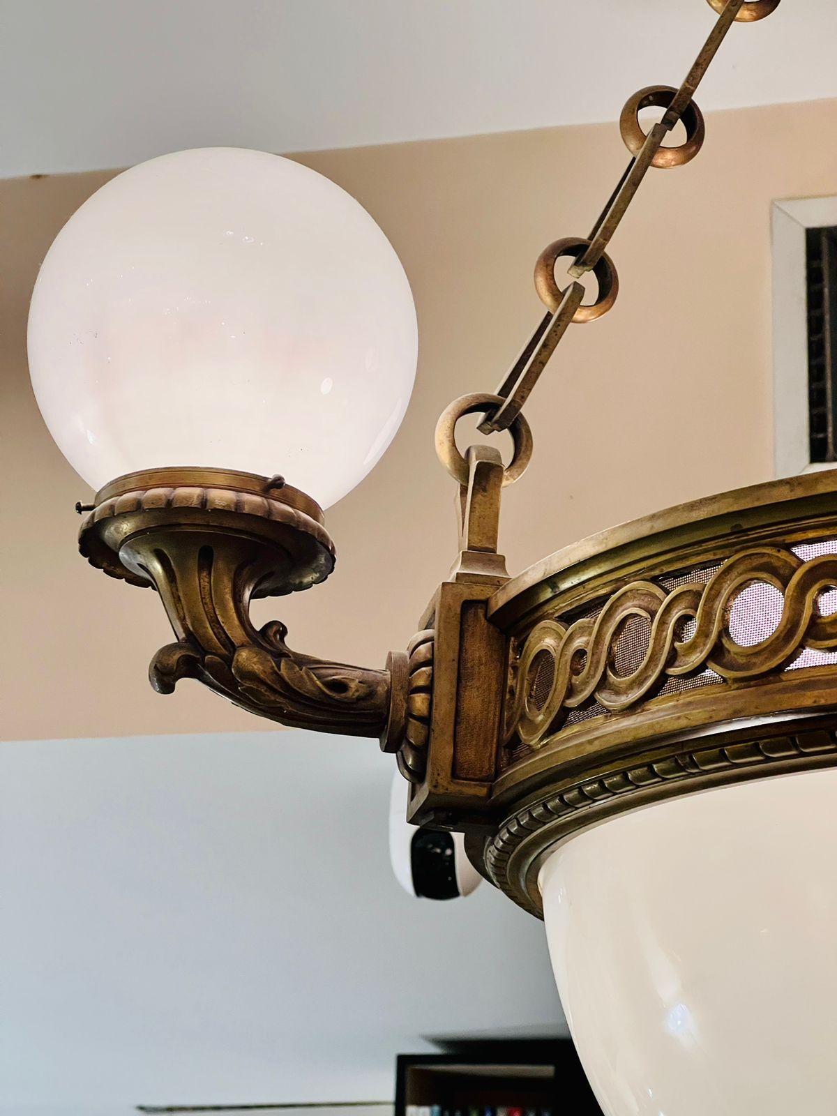 Incredible and rare chandelier in french bronze and opaline from the Monroe Palace in Rio de Janeiro circa 1904 demolished to make way for an avenue. We have two others that make up the set.