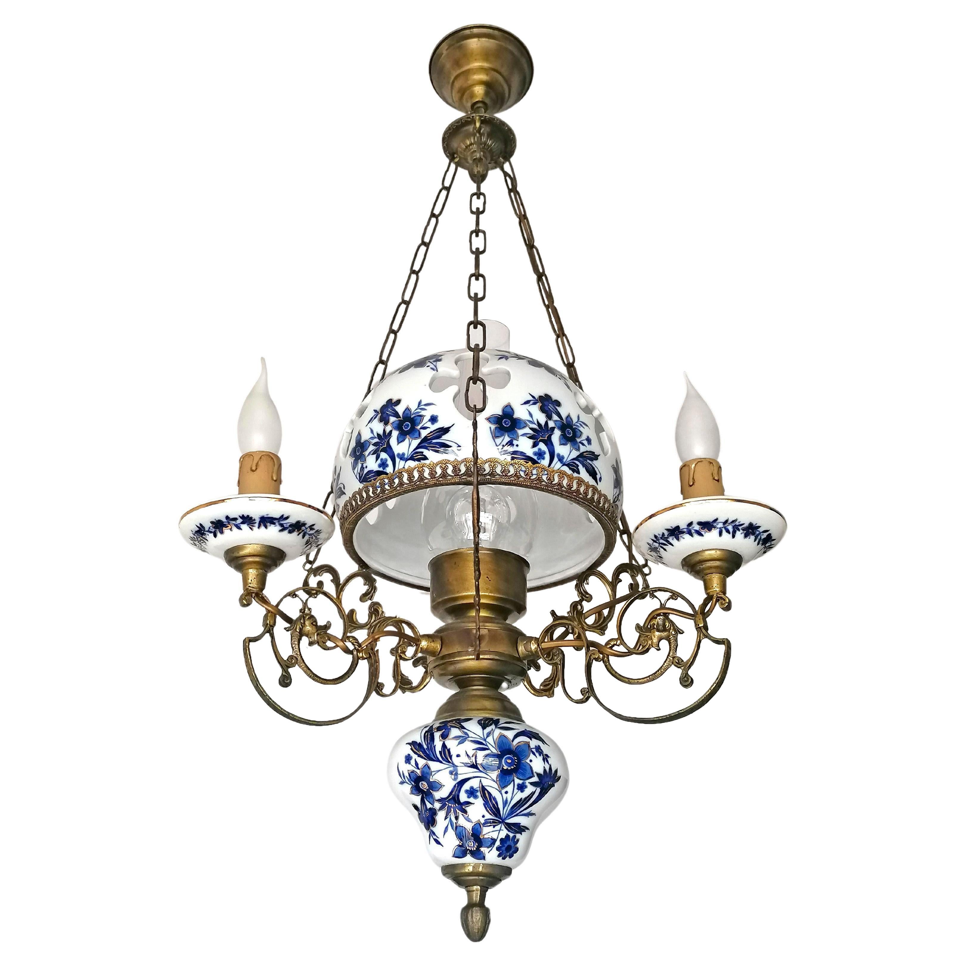 Gorgeous Delft Style French Chandelier Victorian Oil Lamp Blue & Gold Hand Painted Carved Porcelain 

Dimensions: 
Height: 35.43 in. (90 cm)
Diameter: 19.68 in. (50 cm)
4 light bulbs E27, E 14 , Good working condition
Beautiful age patina.
Assembly
