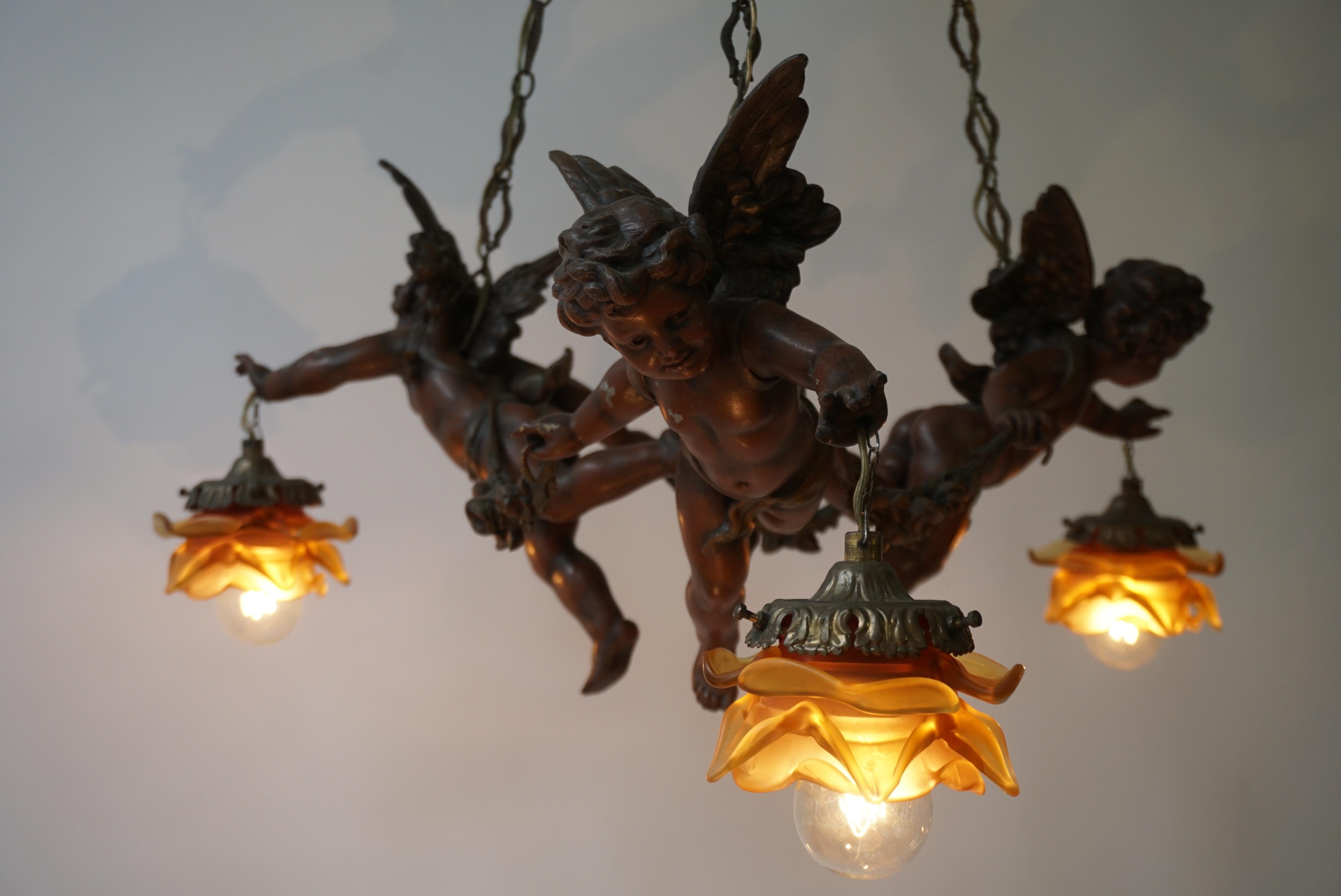 French Chandelier with Three Cherubs Holding the Lights For Sale 9