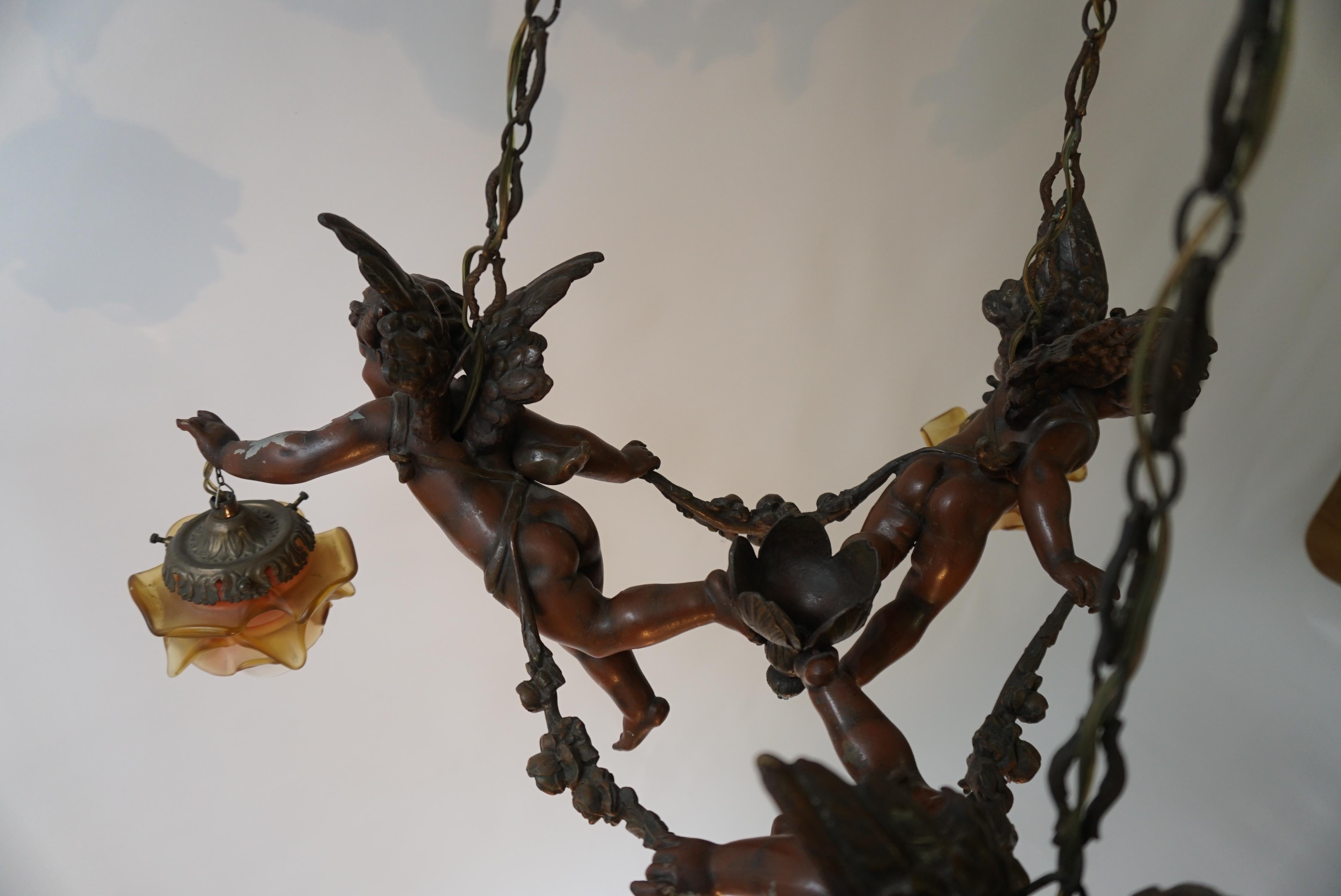 French Chandelier with Three Cherubs Holding the Lights For Sale 11