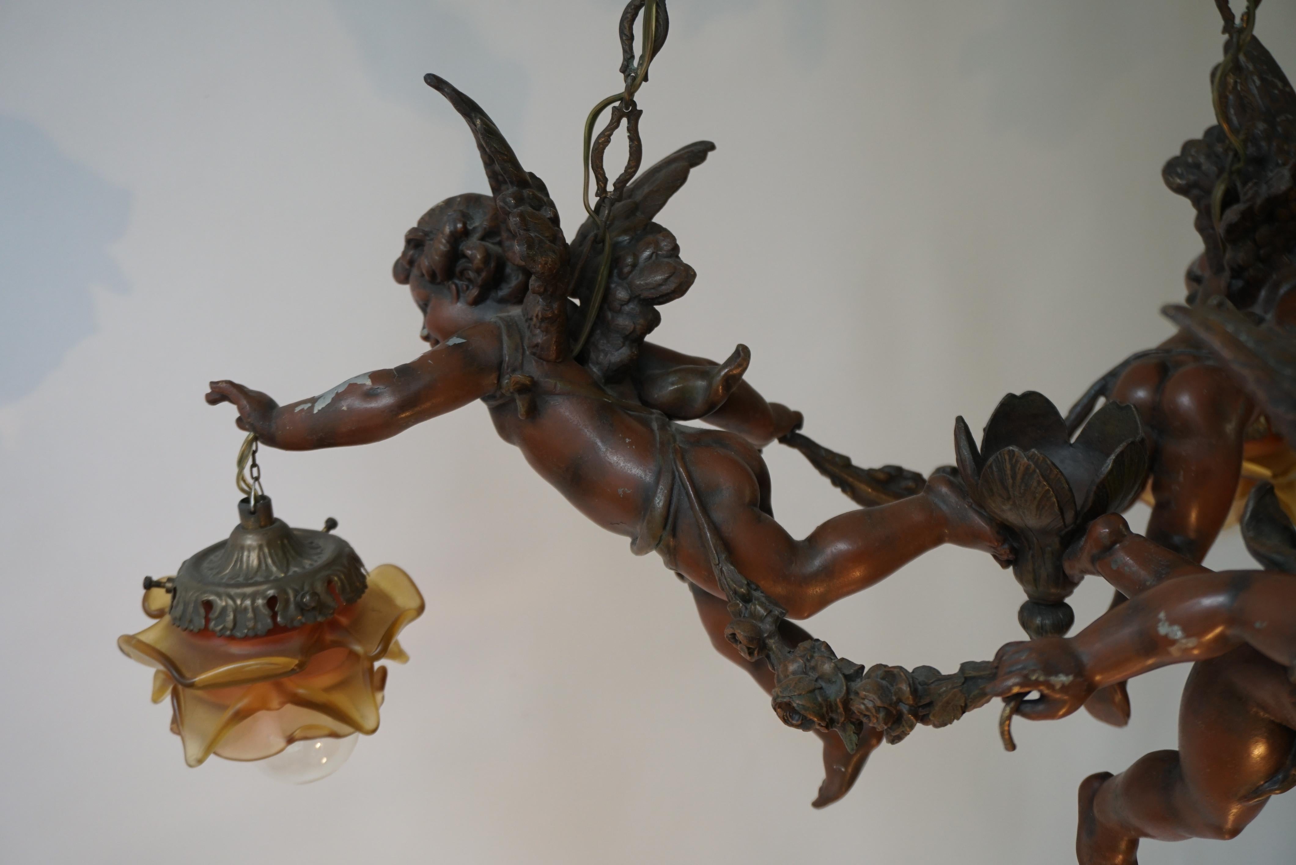 French Chandelier with Three Cherubs Holding the Lights For Sale 12