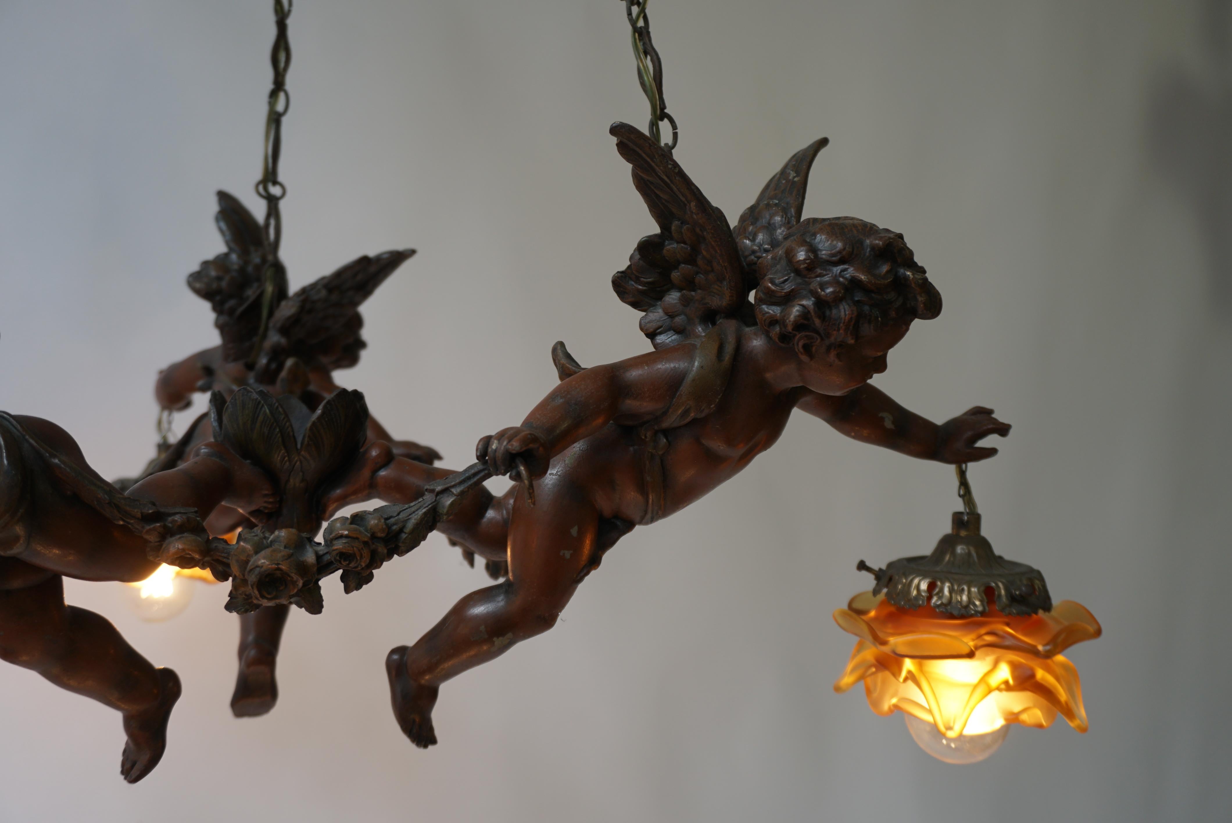 French Chandelier with Three Cherubs Holding the Lights For Sale 13