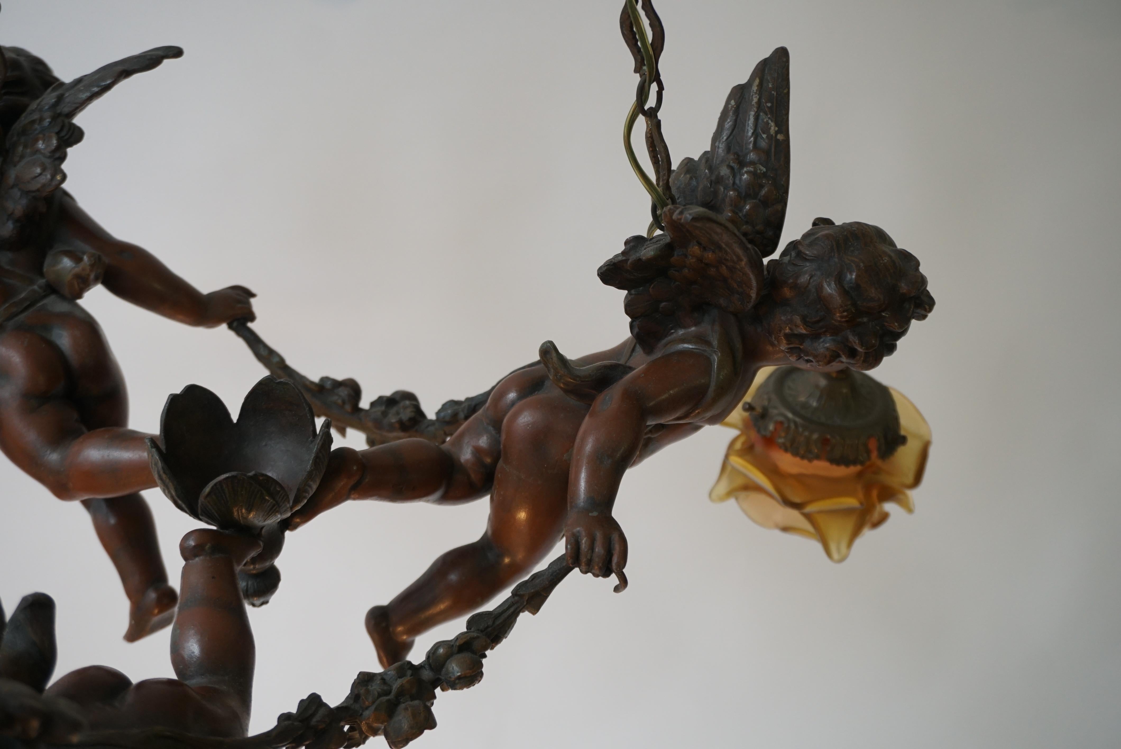 French Chandelier with Three Cherubs Holding the Lights For Sale 14