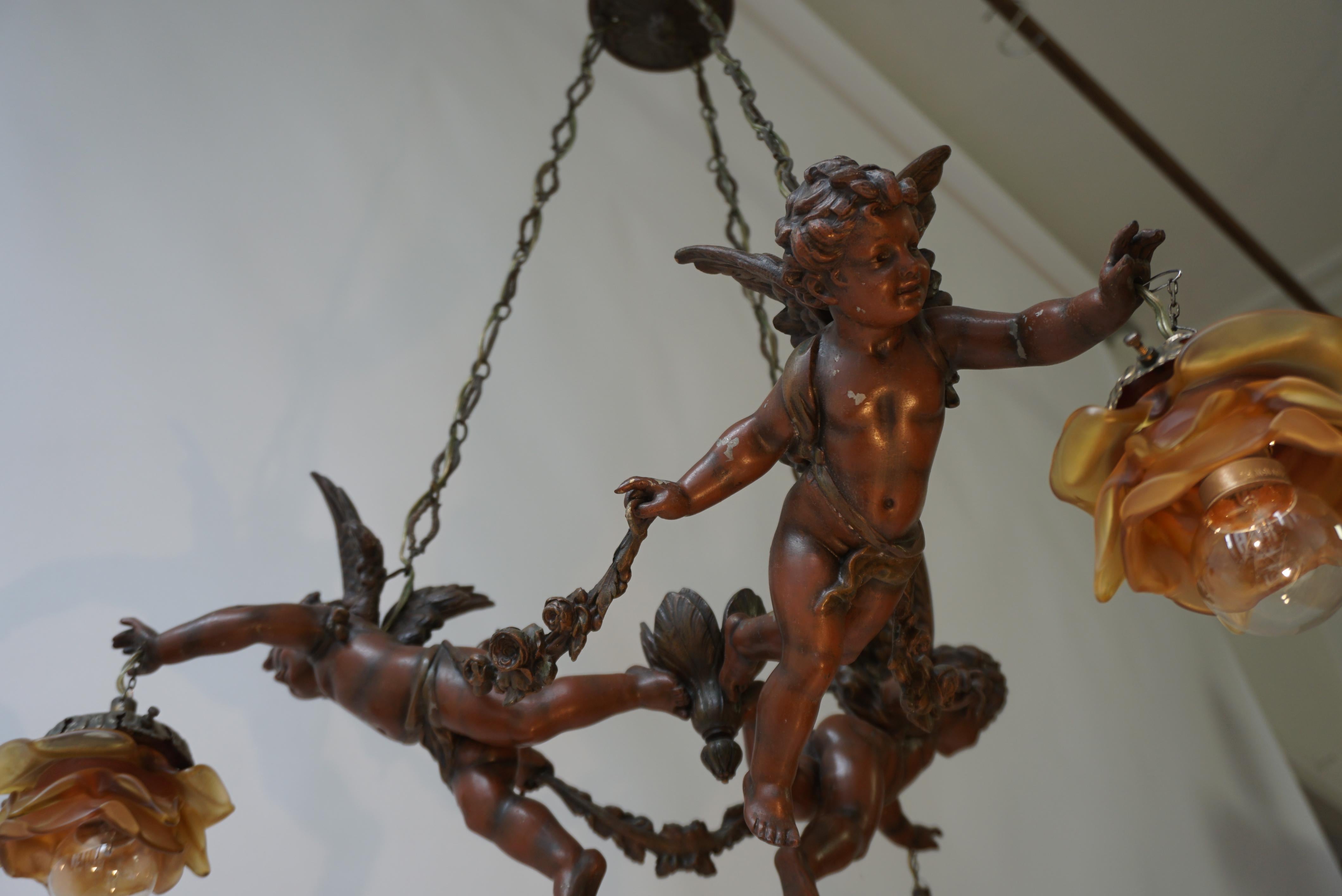 French Chandelier with Three Cherubs Holding the Lights For Sale 15