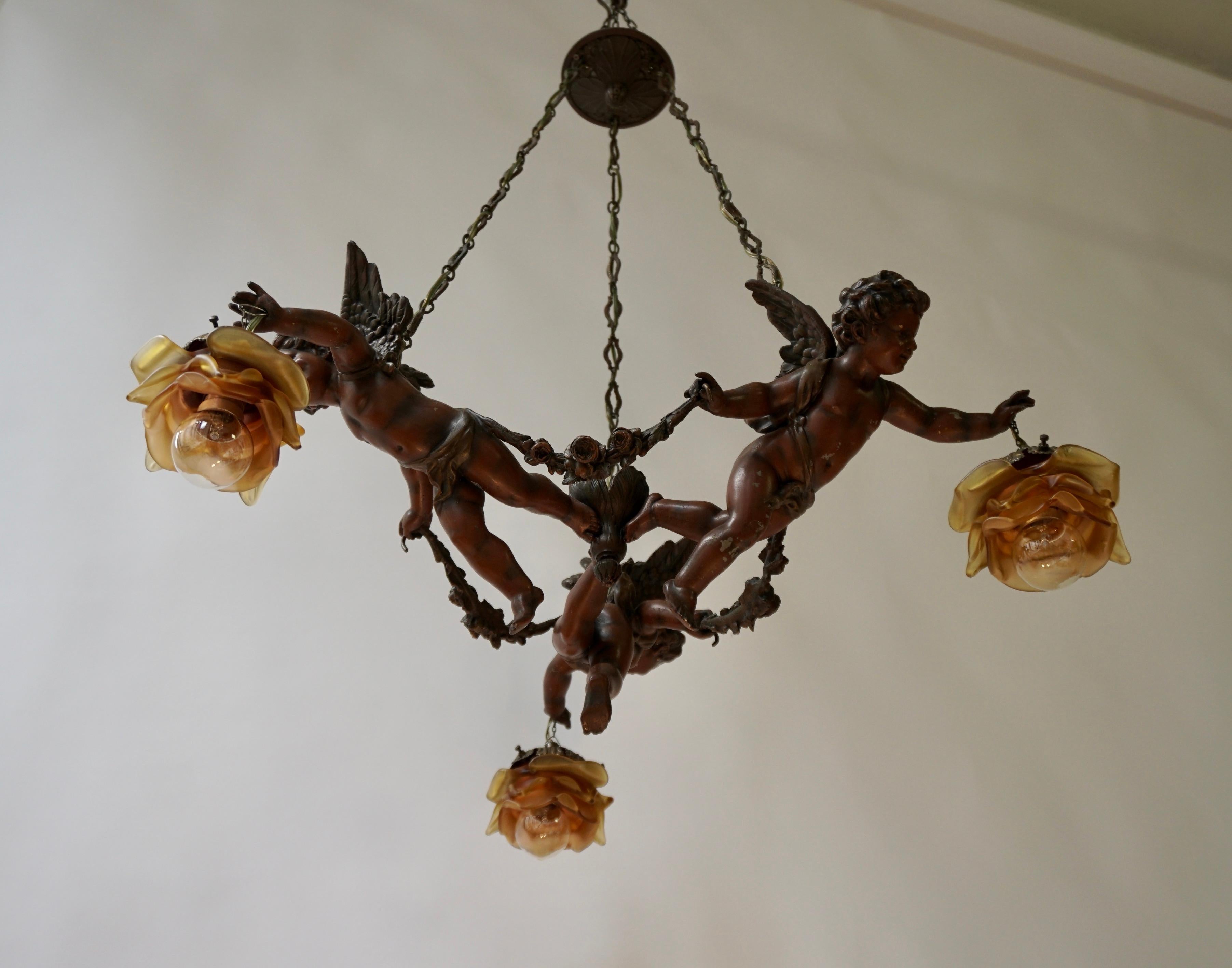 French Chandelier with Three Cherubs Holding the Lights For Sale 2