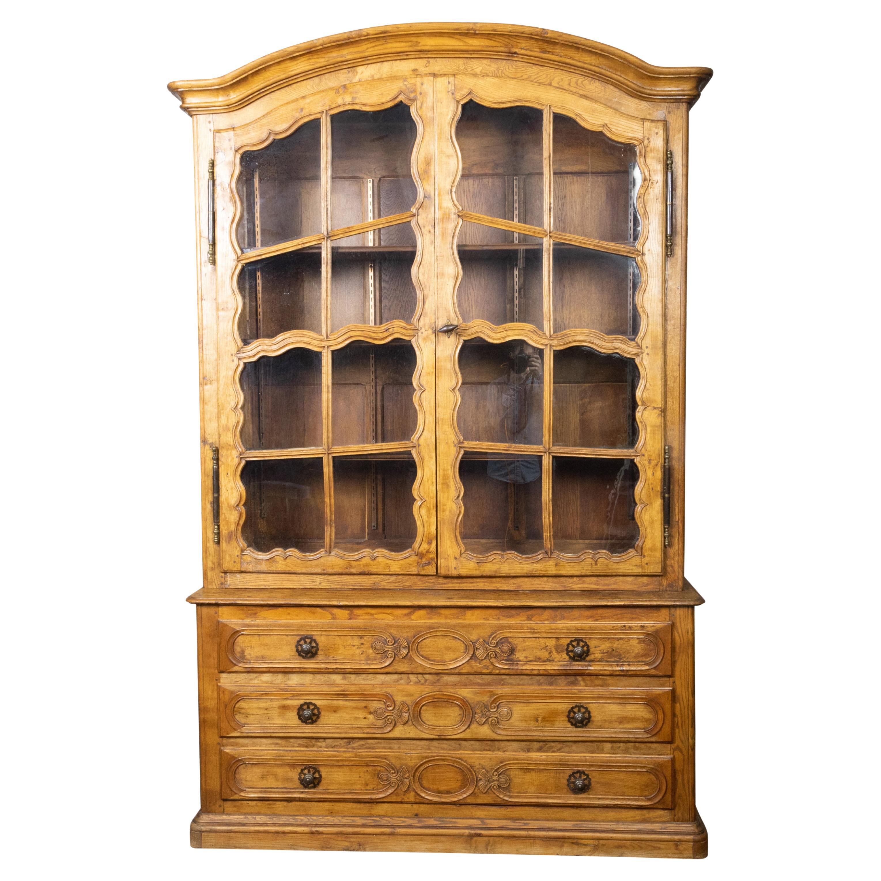 French Chapeau de Gendarme 19th Century Carved Elm Cabinet with Glass Doors