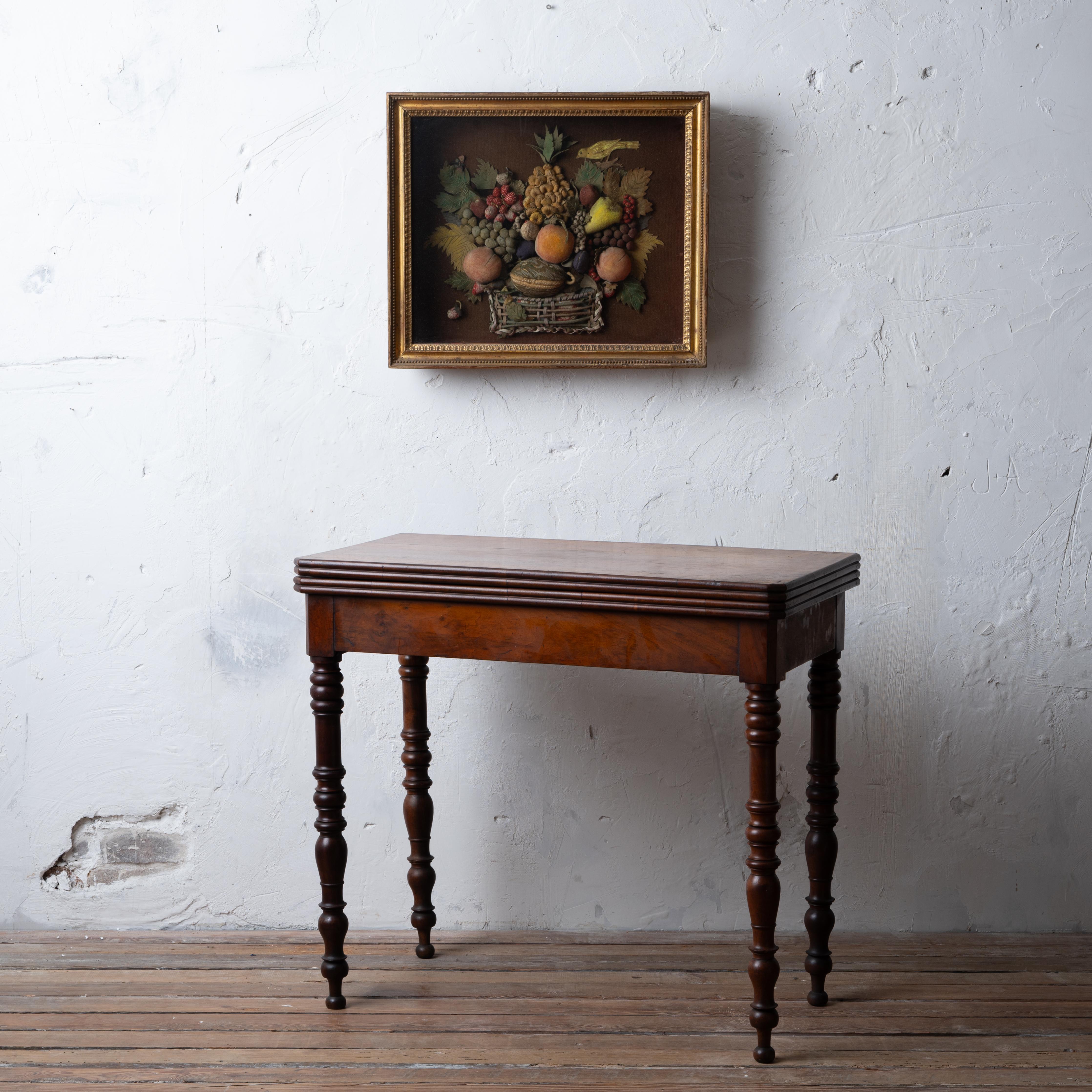 A French flip top game table, late Charles X period. 

Original decorated felt play mat.



33 inches wide by 16 ½ inches deep by 29 ¾ inches tall ; open top 33 by 33 ¼ inches





