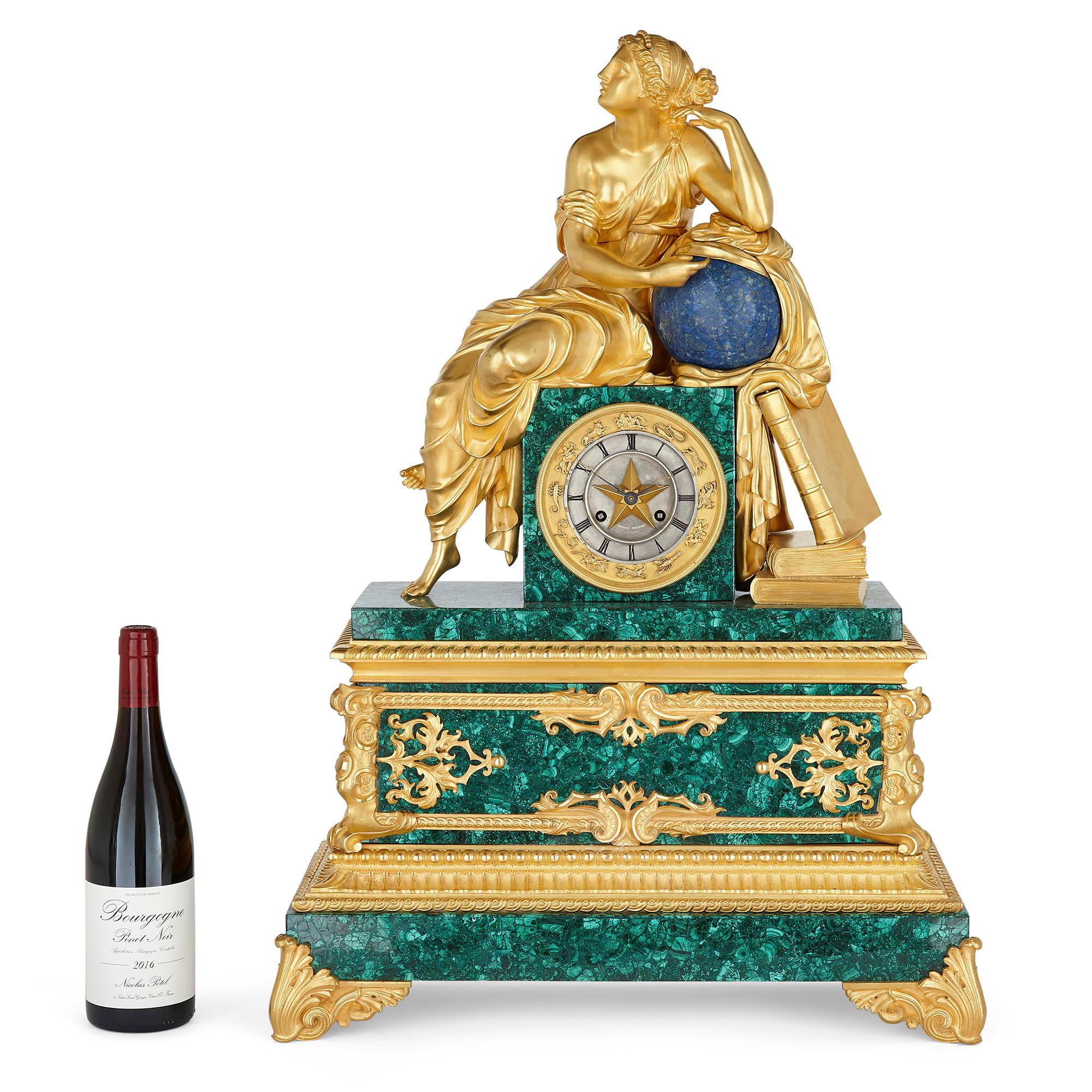 French Charles X malachite, lapis lazuli, and gilt bronze figurative clock
French, c. 1830
Measures: Height 75cm, width 53cm, depth 23cm

This fine mantel clock is a superb example of the Charles X style. The clock, wrought from malachite, lapis