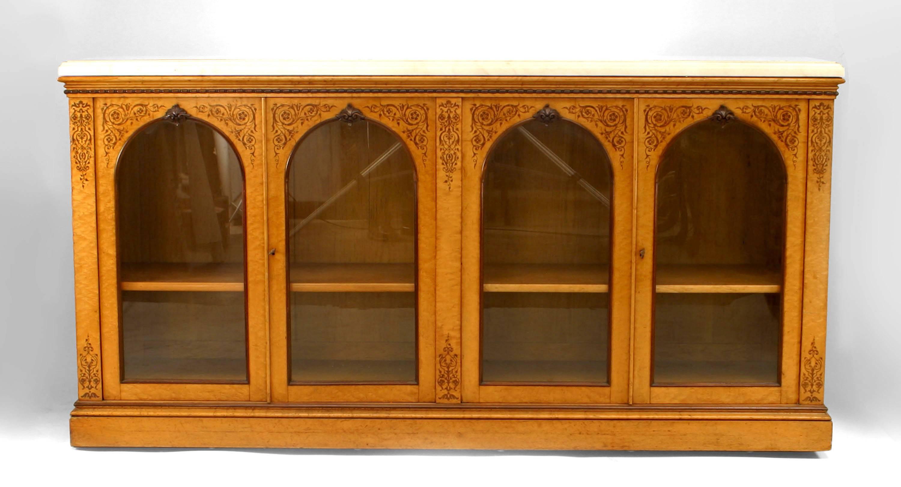 French Charles X maple and rosewood inlaid sideboard cabinet with 4 arched top doors and white marble top.
