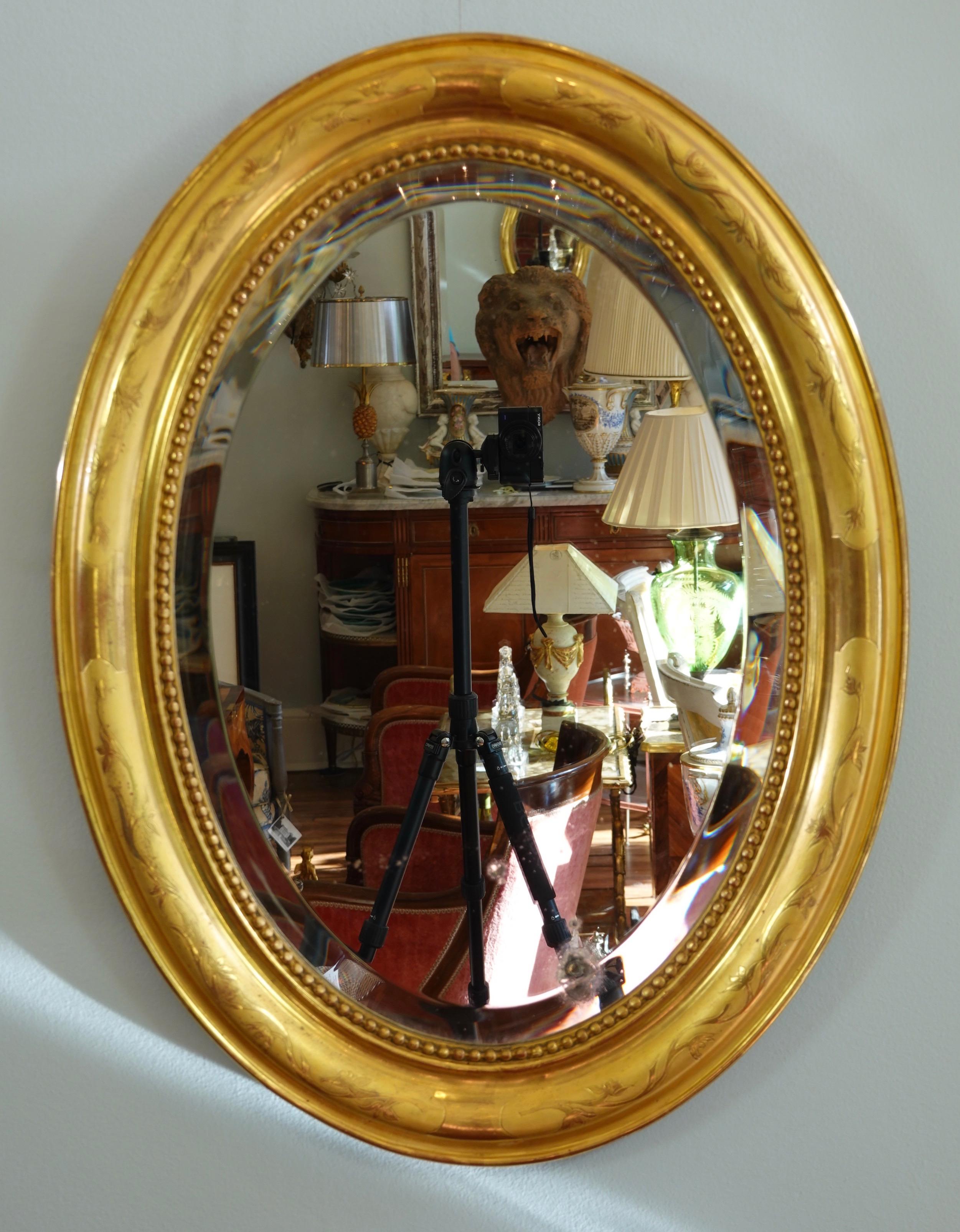 Gilt French Charles X Oval Mirror with Beveled Glass For Sale