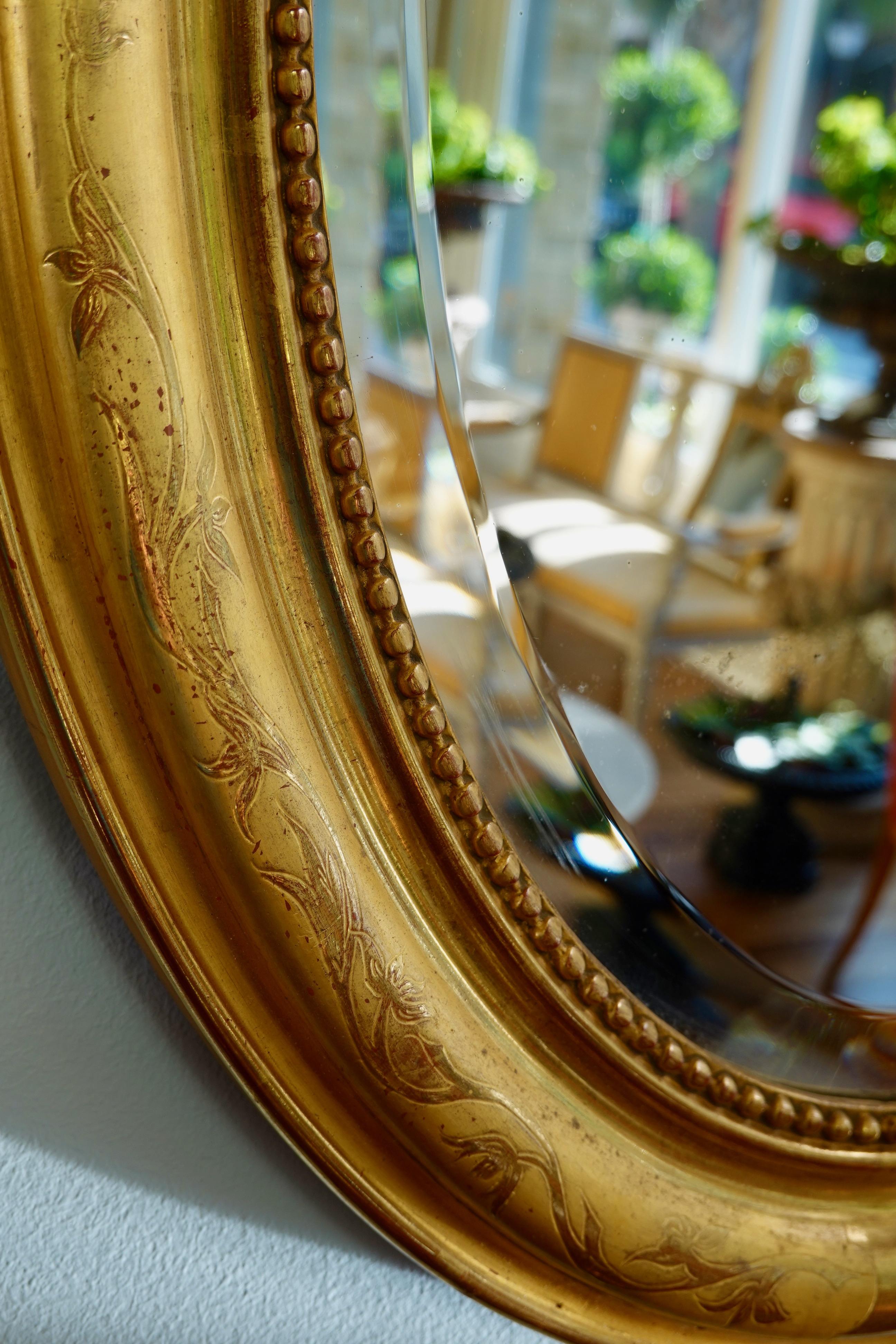 Miroir ovale Charles X français avec verre biseauté en vente 1
