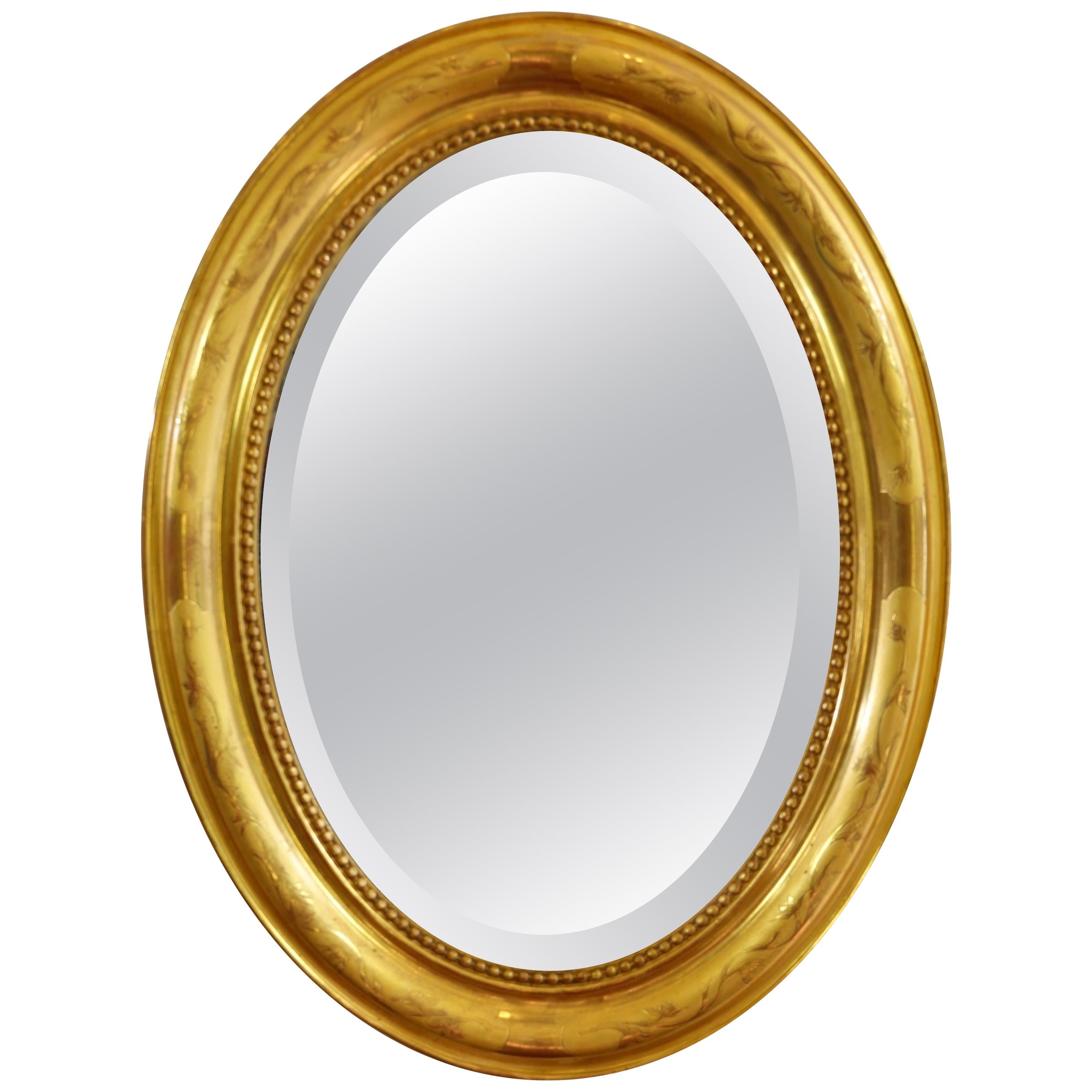 French Charles X Oval Mirror with Beveled Glass For Sale