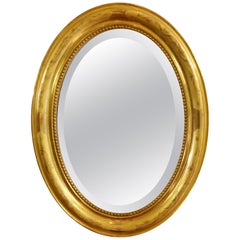 French Charles X Oval Mirror with Beveled Glass