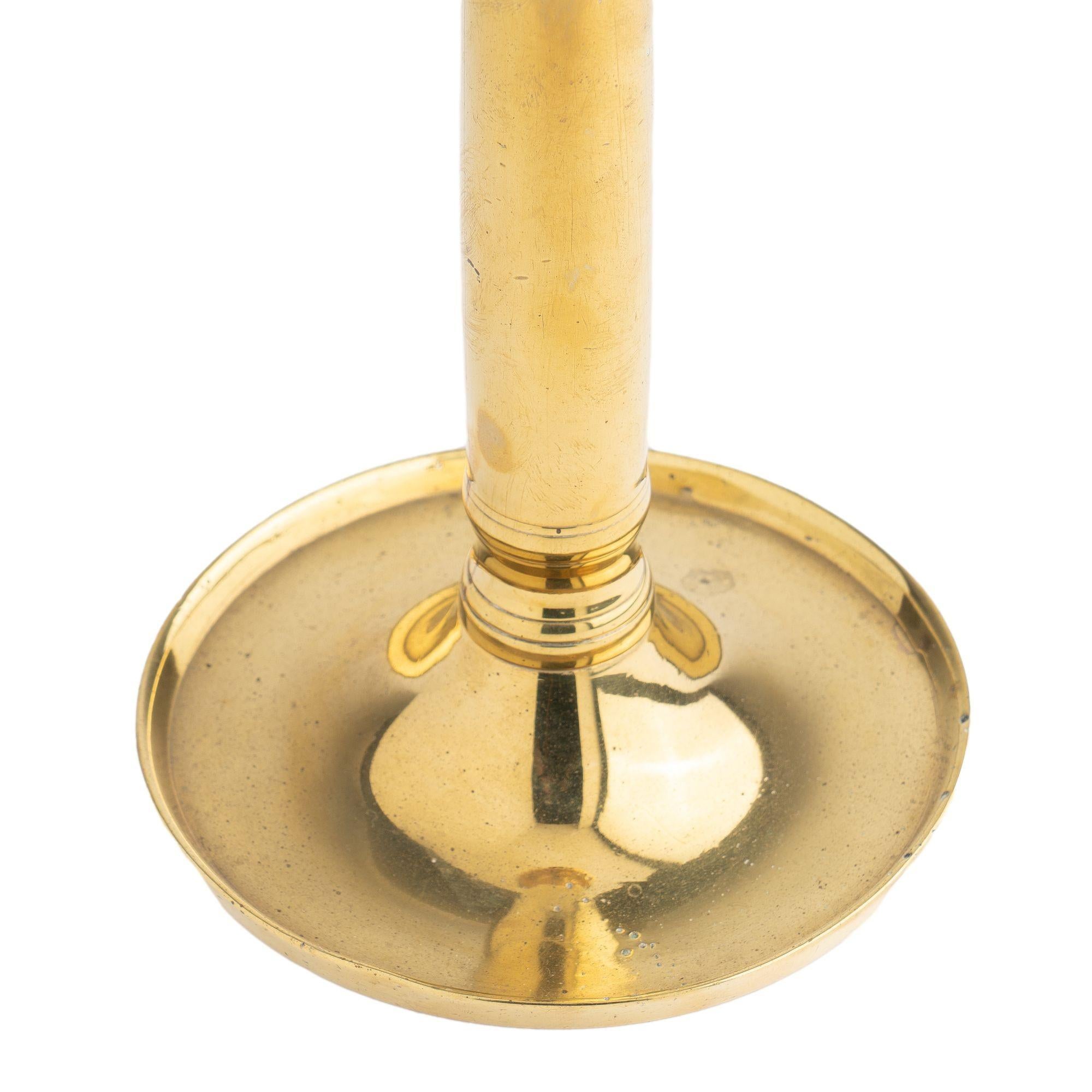 Brass French Charles X period cast brass columnar candlestick, 1815-30 For Sale