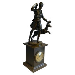 French Charles X Period Patinated Bronze Mantel Clock with Bronze of Diana