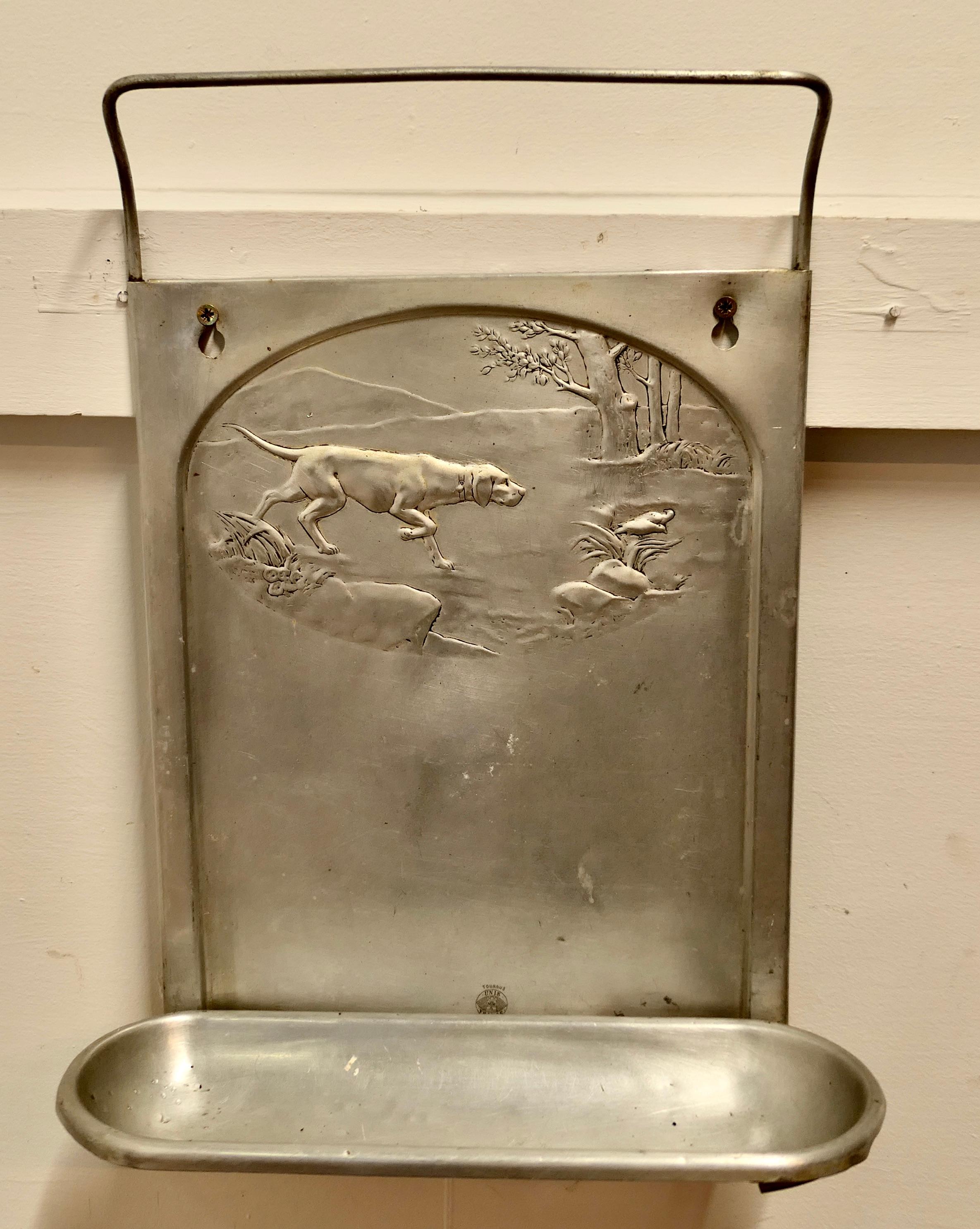 French Chasse Inspired Towel and Soap Rack

Just the thing for the smallest room in the house, made in aluminium and embossed with a French Hunting Dog scene 
The rack fits on the wall with a rail for the towel and a long soap dish
The Rack is 19”