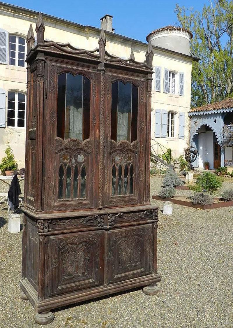 Rare French 19th century bookcase vitrine dresser direct from a Chateau Barn 
This will be cleaned and waxed before shipping (not dirty just forgotten and neglected)
Photos taken in sunlight in Chateau grounds
Stunning Gothic Revival French