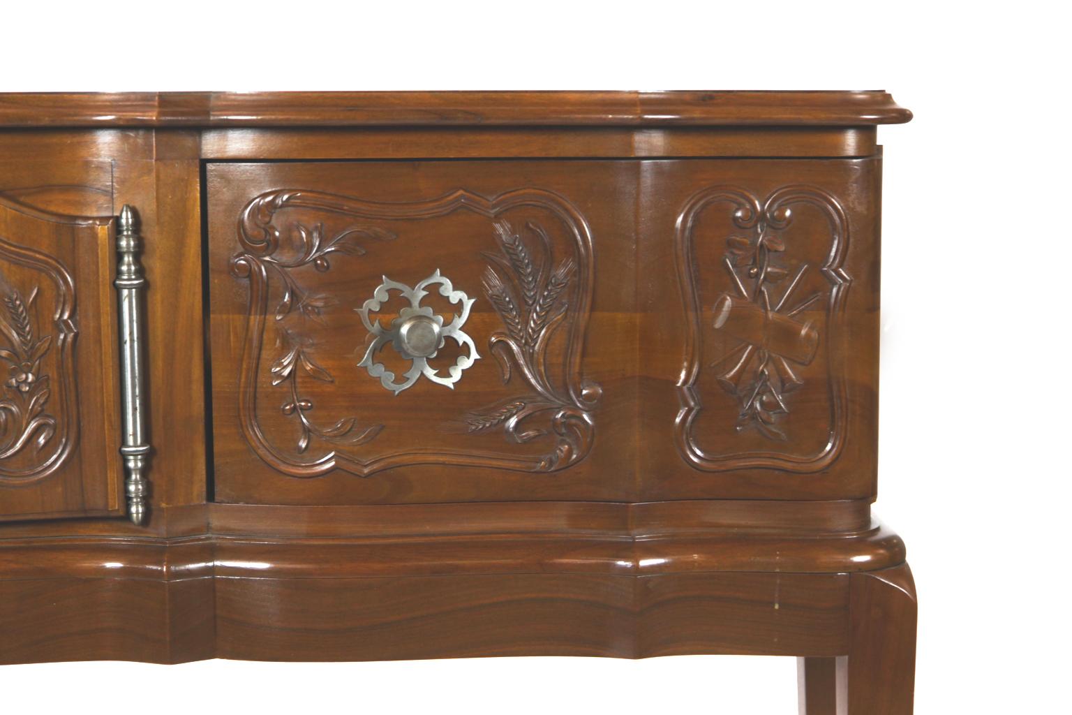 French cherry hall console table, with multi-shaped front, carved doors slide to the side with steel knobs, double center carved doors with steel escutcheons, on tapered legs.