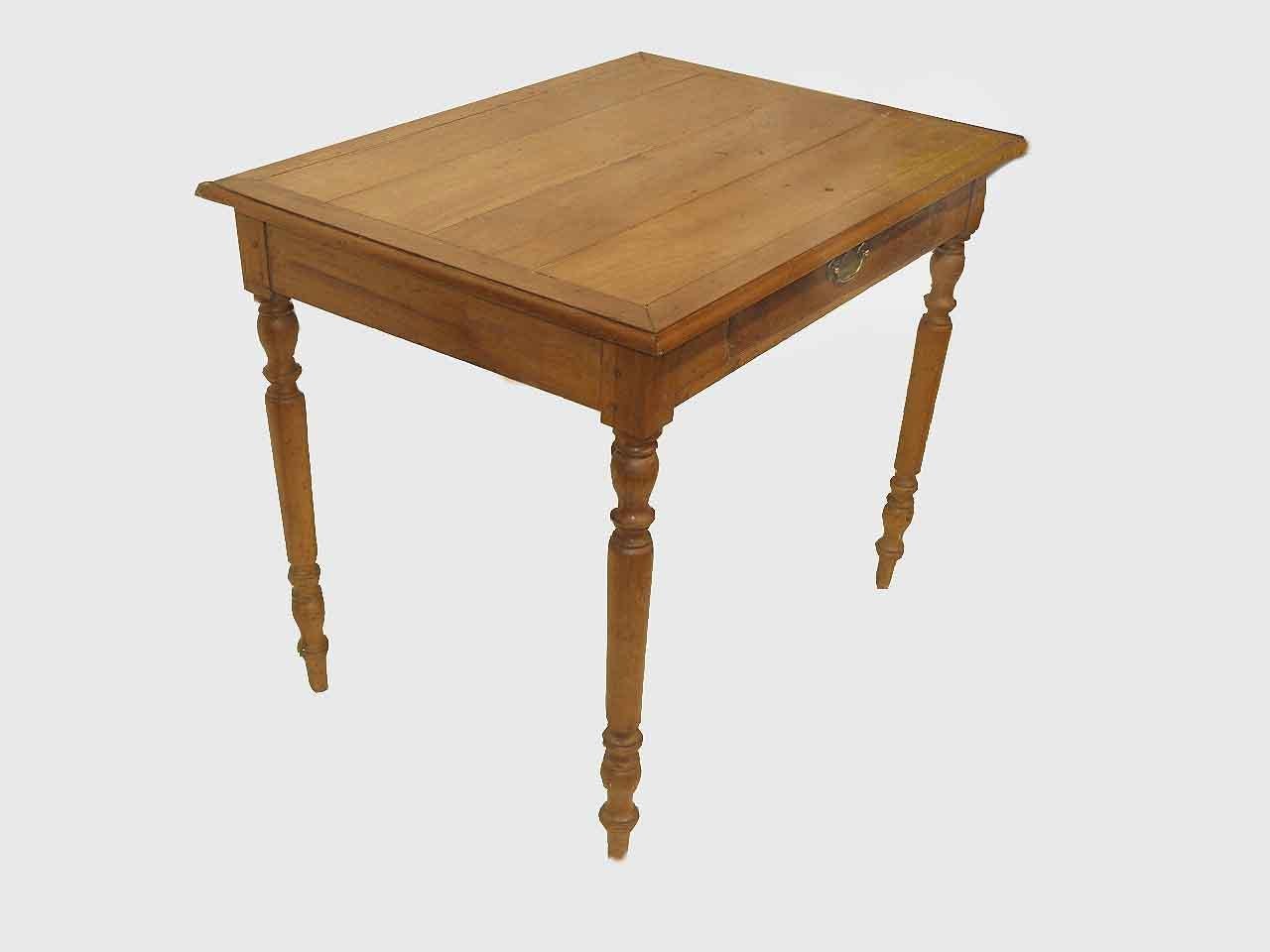French cherry one drawer side table, the multi board top with beautiful grain and patina is ''bread boarded'' around the entire perimeter and has a molded edge. The drawer has a single brass pull; slender legs with crisp turnings. Double exposed peg