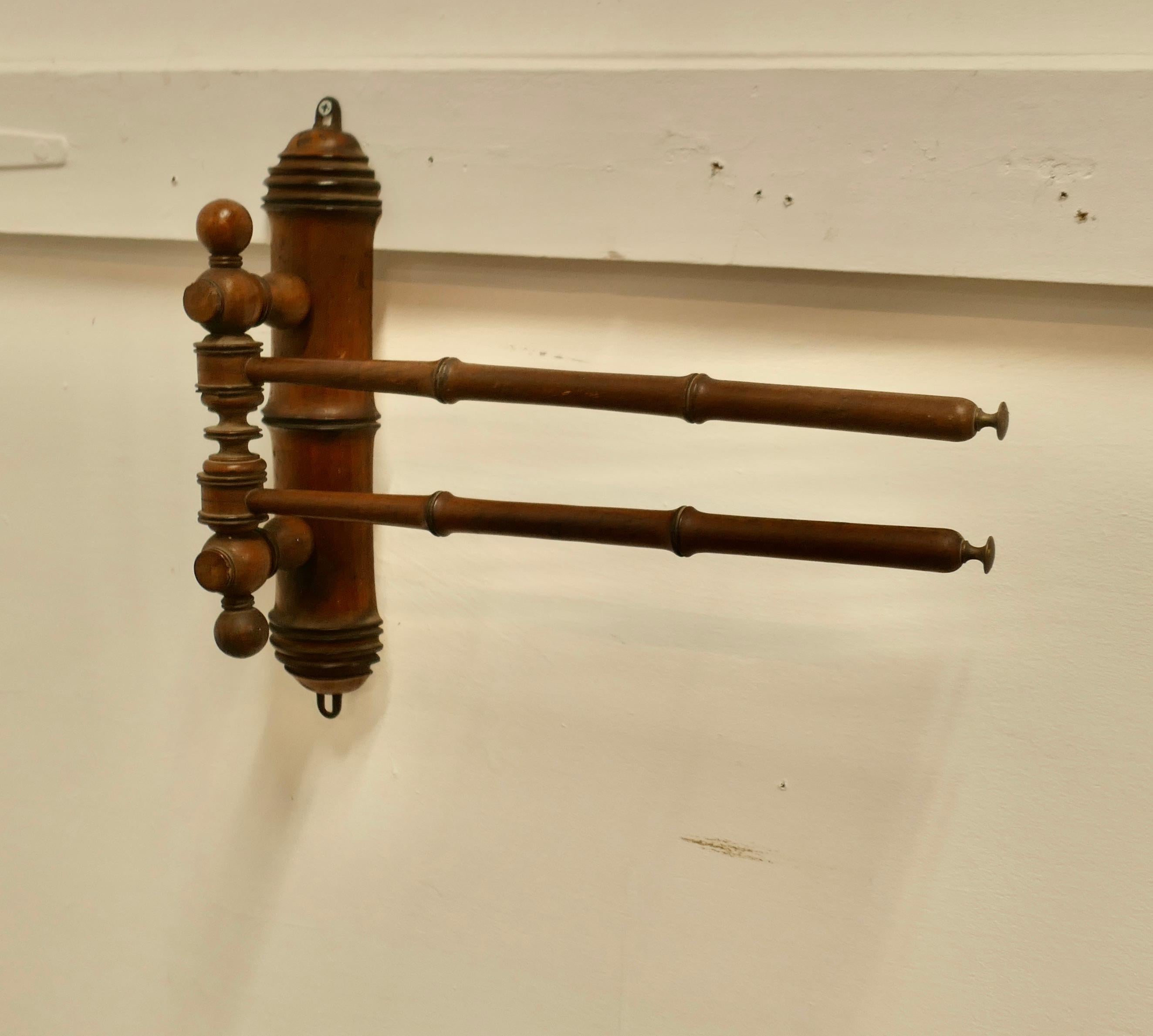 French Cherry Wood 2 Branch Folding Towel Rail

This is an elegant little towel rail, it is turned in cherry wood and has 2 swinging arms, these can be set at a choice of angles up to  180°
The rail is 18” long and 13” high  
TZX460