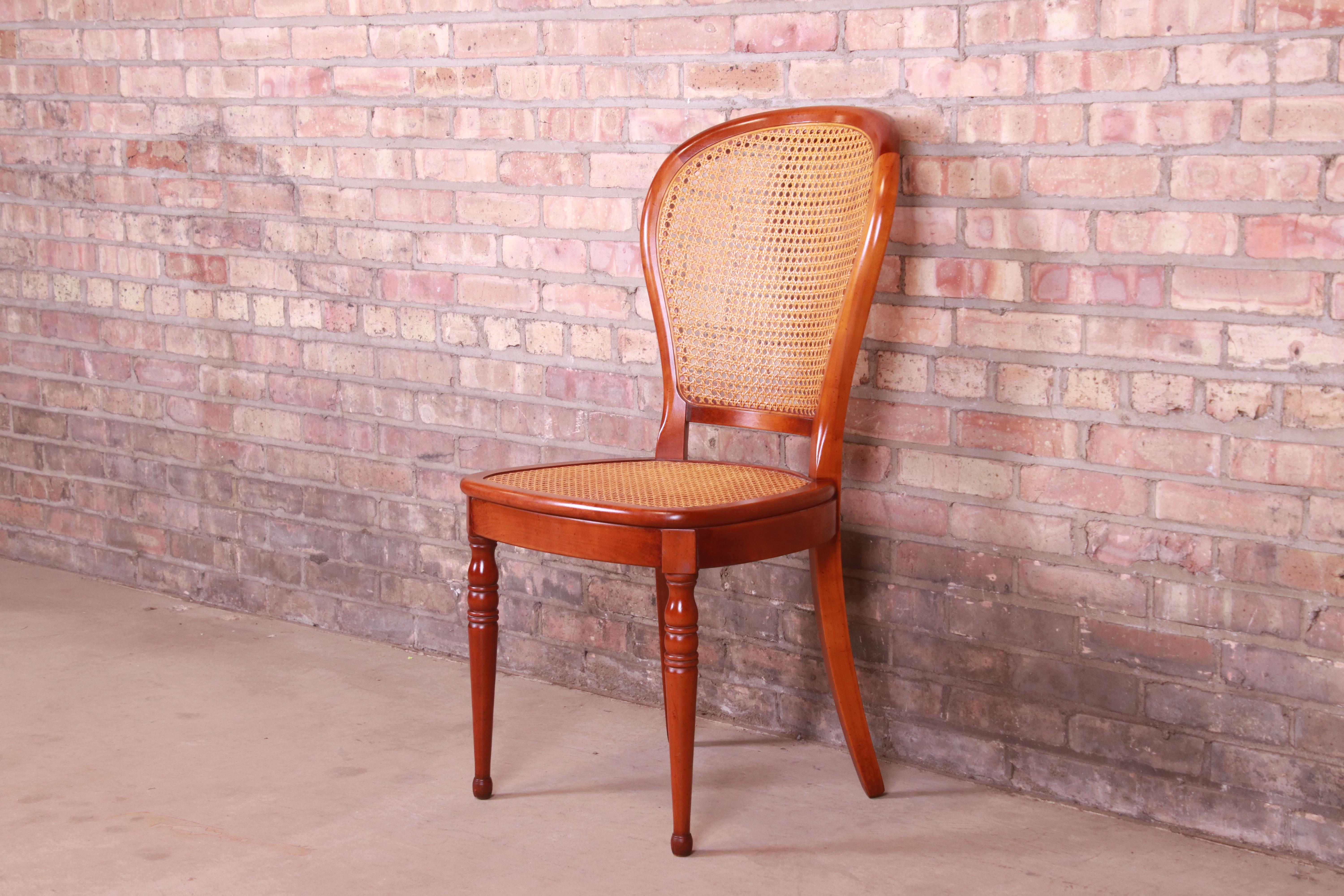 French Cherry Wood and Cane Balloon Back Desk Chair Attributed to Grange In Good Condition In South Bend, IN