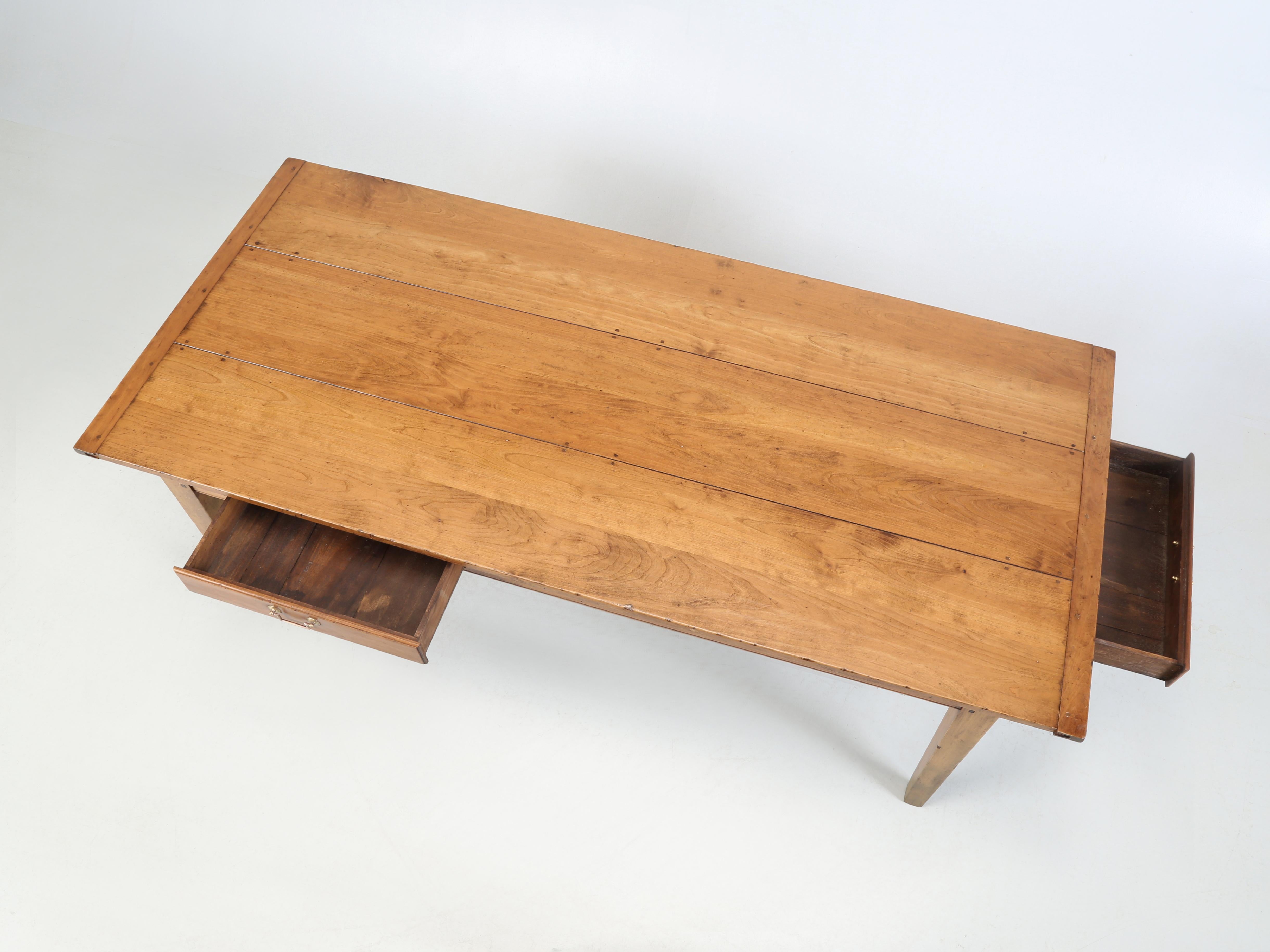 French Cherry Wood Farmhouse Style Dining Table with Tapered Legs and Two drawers. Around 30-Years ago, we found a company in the north of England making exquisite, Country French Farm Tables the old fashion way, by hand. Our French style Farm Table
