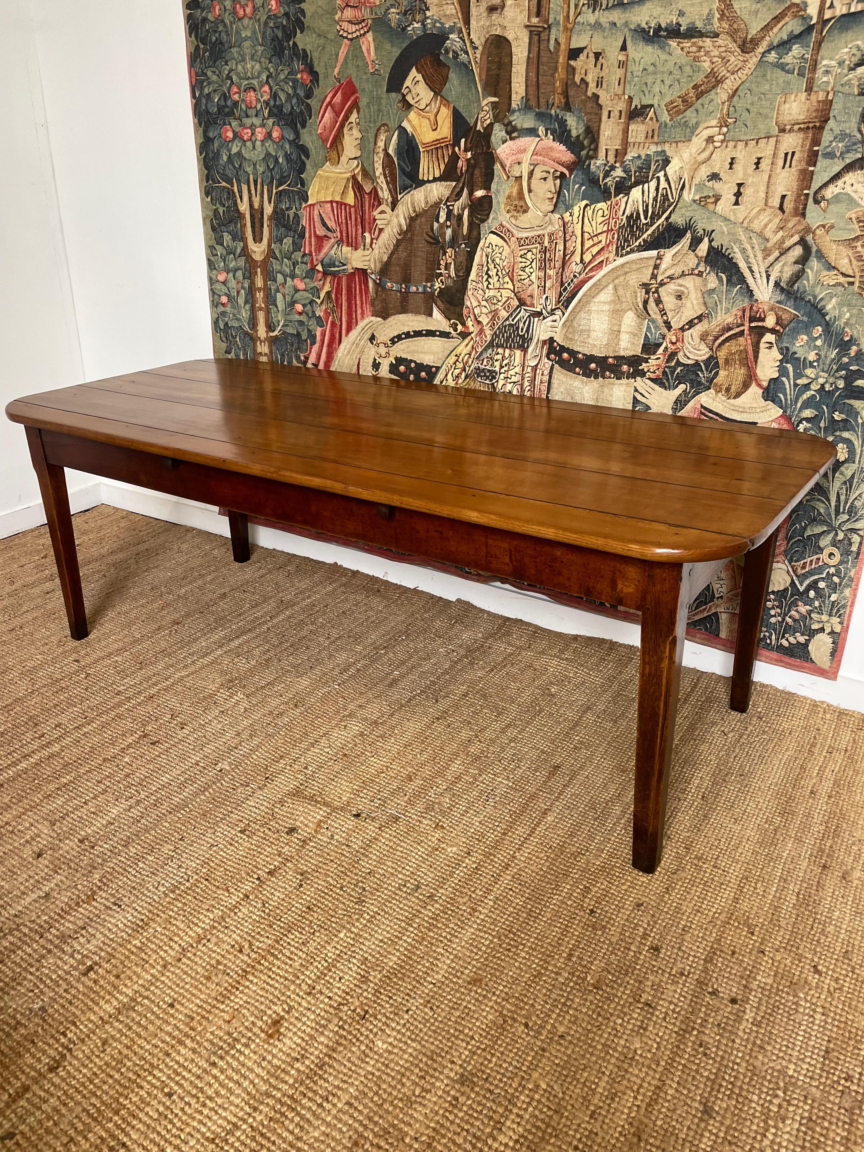 Great example of a mid 19th century cherrywood farmhouse table
Constructed from solid cherrywood , this piece has been through our workshops and been cleaned / polished
All the joints are firm . The legs have been tipped to give it the correct