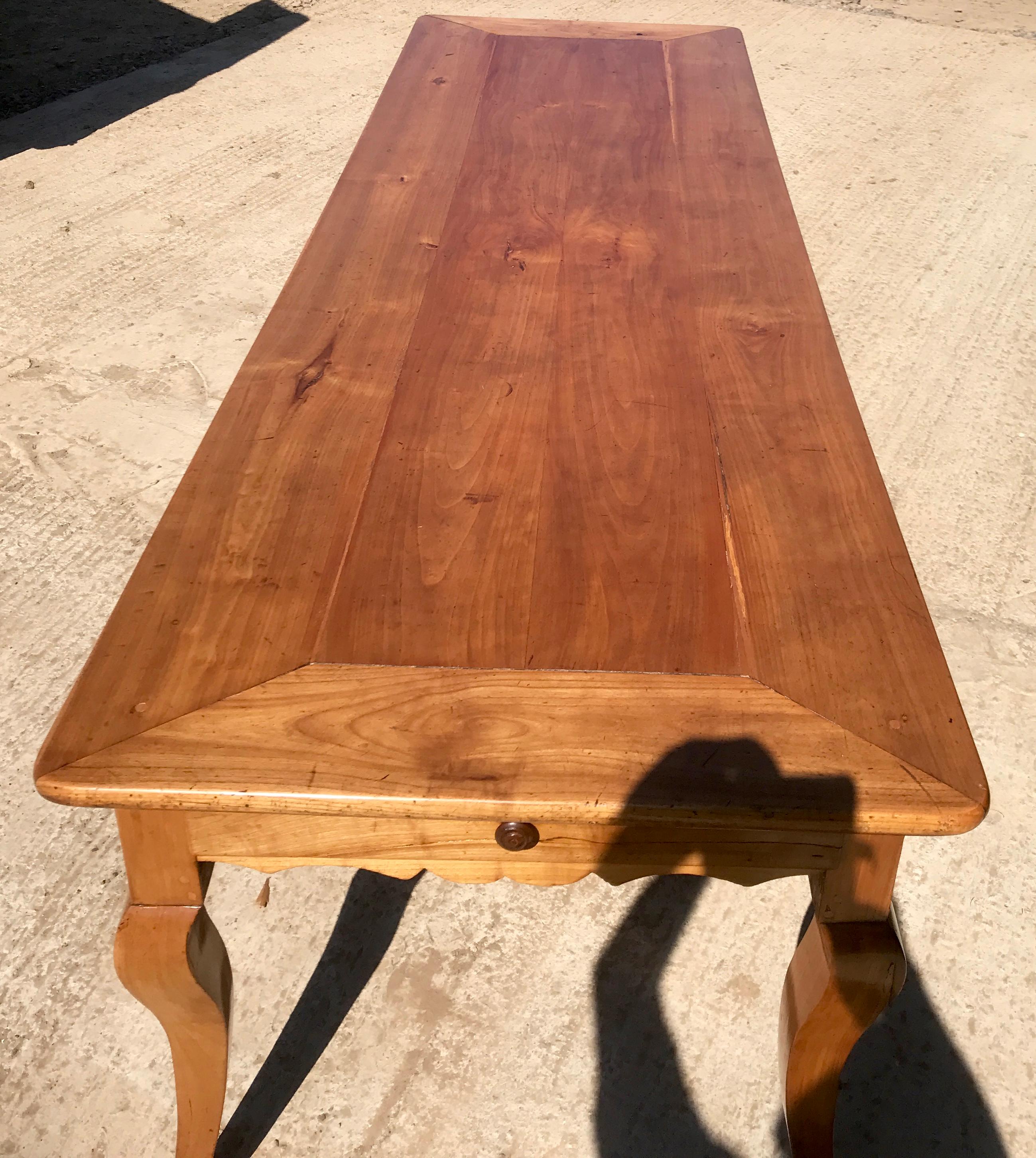French cherrywood farmhouse dining table. Cherrywood table in great colour, size and condition. Perfect height to sit at no problem with the knees on the underside of this table. It is all round a great table. Height to the underside is 61 cm. 3