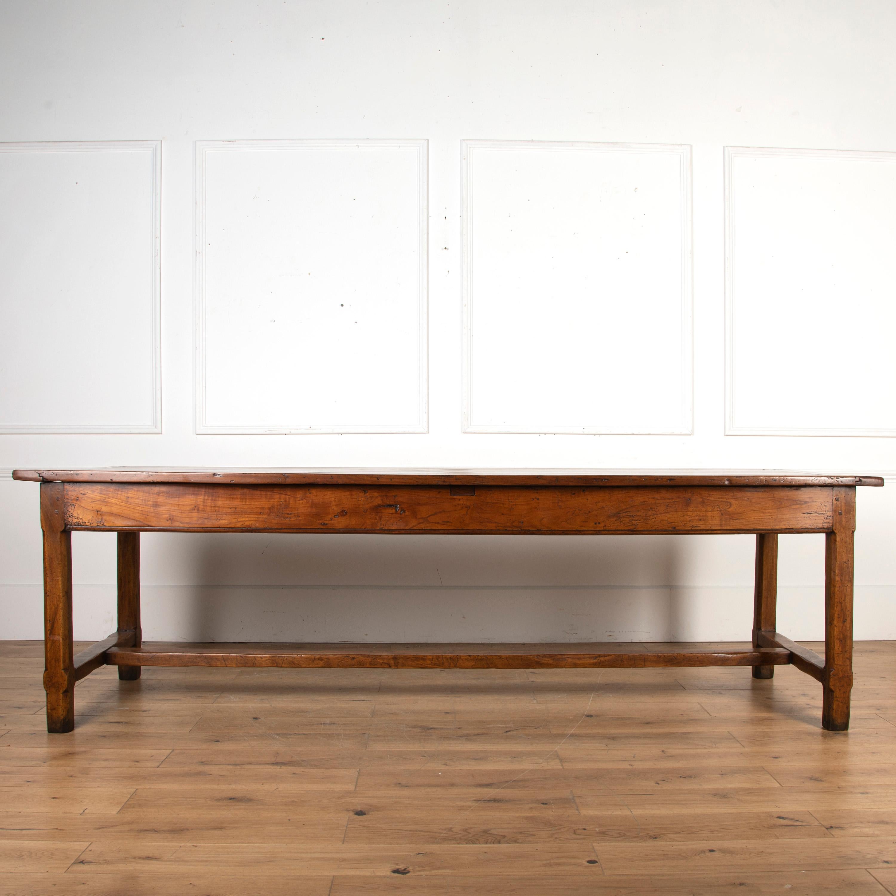Fantastic mid 19th century solid cherrywood farmhouse table.

This fabulous table dates to the mid 19th Century and will seat 8-10 people. This table would also be suitable for being used as a wonderful desk, library, or dining table. 

It has a