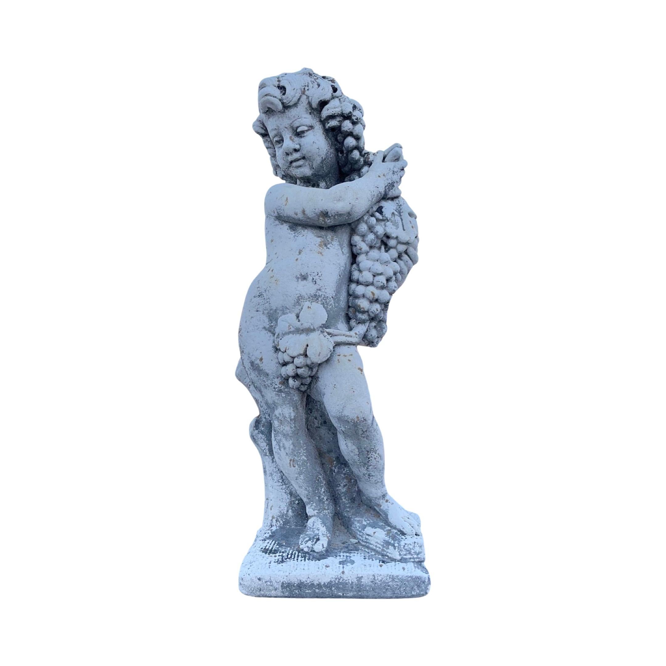 This 18th century French sculpture is made of a durable cement composition and features a lovely cherub figure. Crafted with precision and artistry, this sculpture is a beautiful addition to any collection and a testament to the enduring beauty of