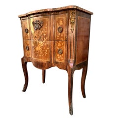 French chest of drawers in wood and bronze, Louis XV and Louis XVI transition