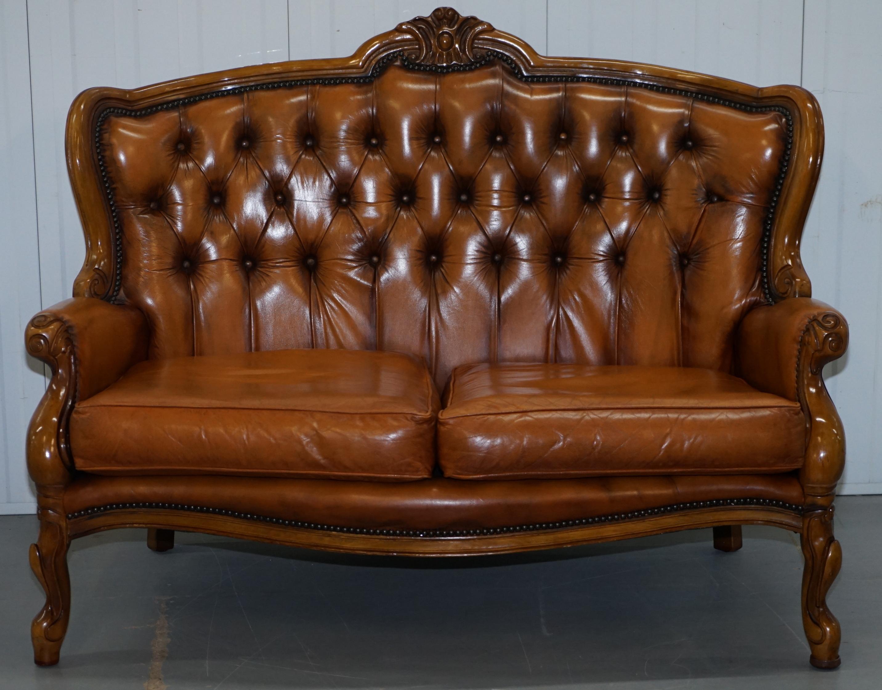 We are delighted to offer for sale this vintage aged tan brown leather French Chesterfield three piece suite 

A good looking well made and decorative set in good vintage Mid-Century Modern condition. This suite dates from the 1950s-1970s which is