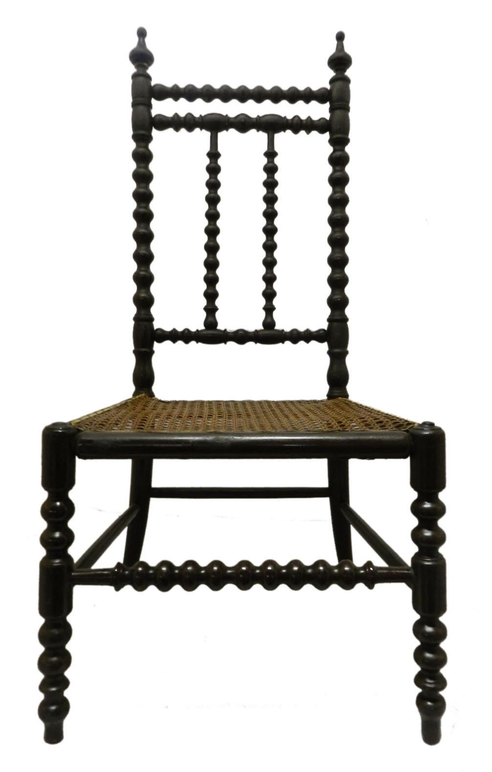 French cane and bobbin child's chair, late 19th century
Bobbin turned frame and bergere caned seat.
Original dark brown, black frame
Very decorative
Good condition with minor signs of age.


 