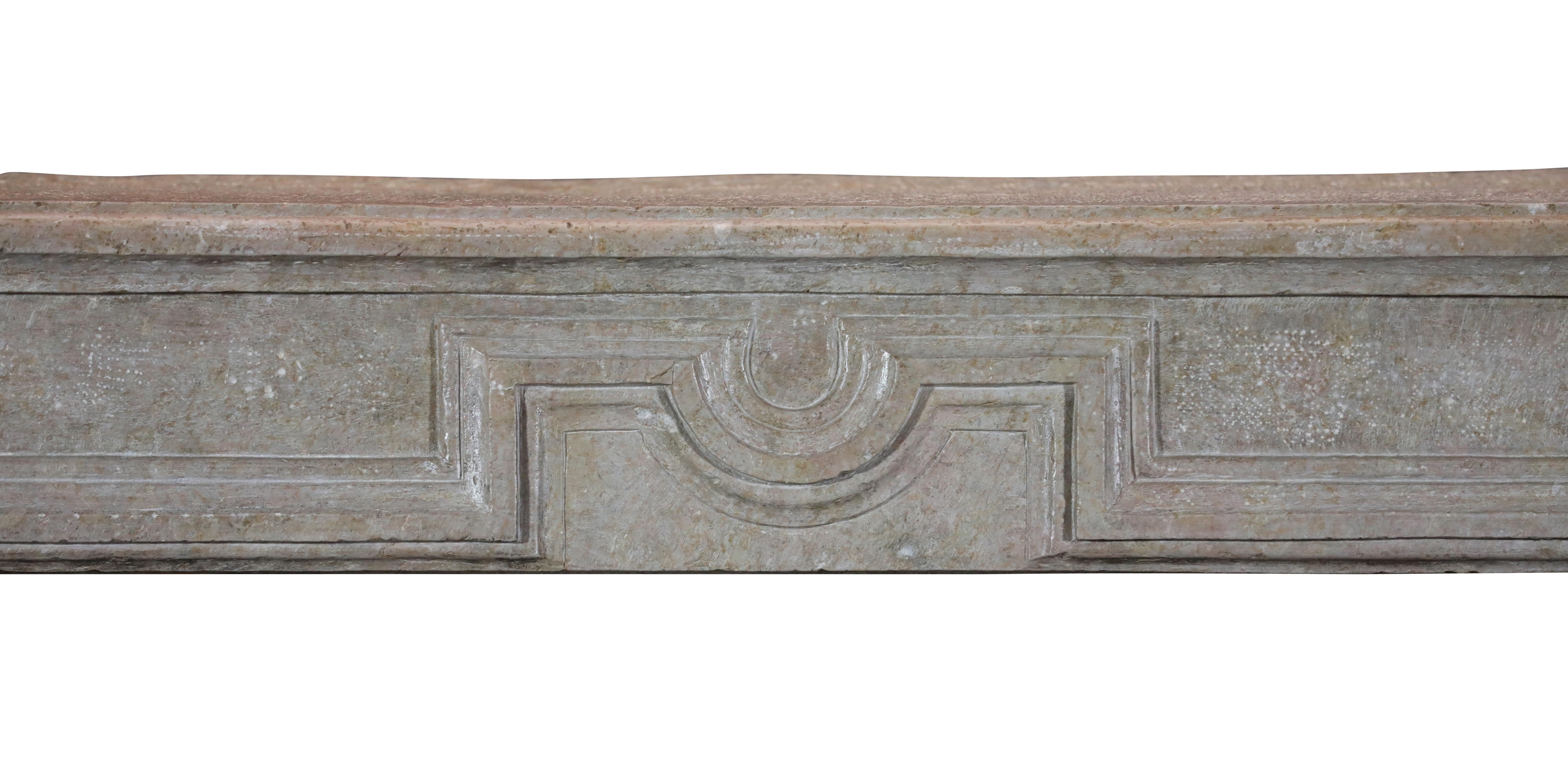 Limestone French Chimney Piece With Fleur De Lys For Timeless Modernist Interior Concept For Sale