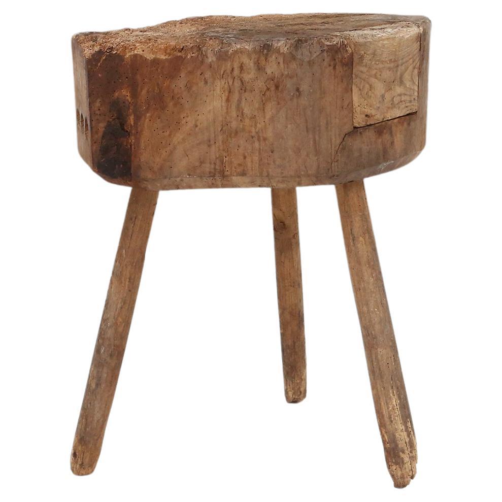 France / 1850 / chopping block or table / wood / rustic / mid-century 

This massive table with its simple natural design was made around 1850 in France as chopping block. With its 3 legs and impressive trunk-shaped top it perfectly serves as table.
