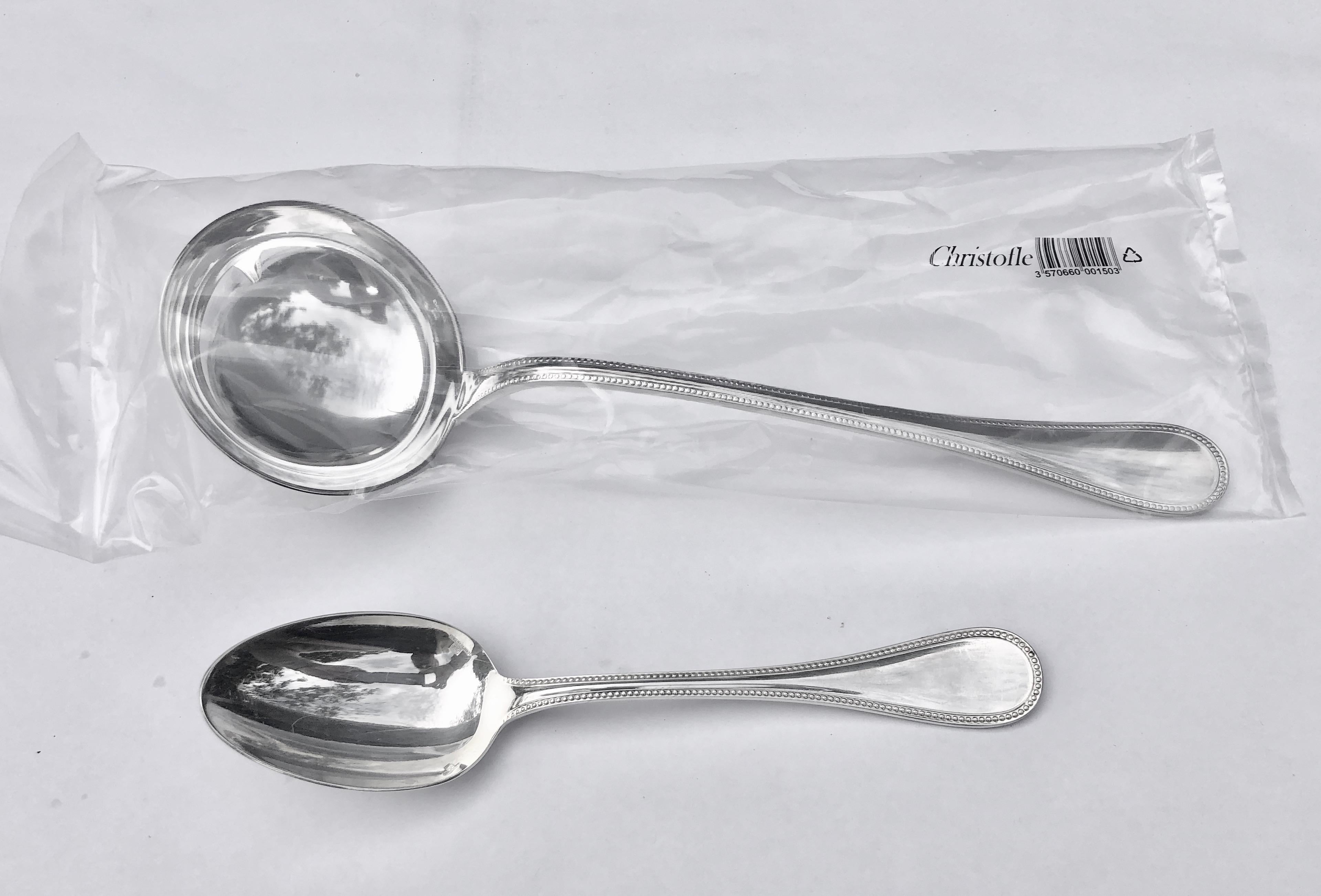 This is a lovely set of 12 French Christofle Perles silver plated soup spoons and one Perles silver plated soup ladle. The Soup ladle has never been used and comes in its original box still, in its original plastic wrapping. The 12 soup spoons are a